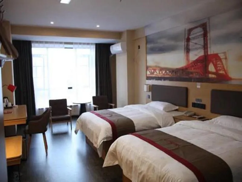 Bed in Thank Inn Plus Hotel Hunan Yongzhou Jiangyong County Yonghua International