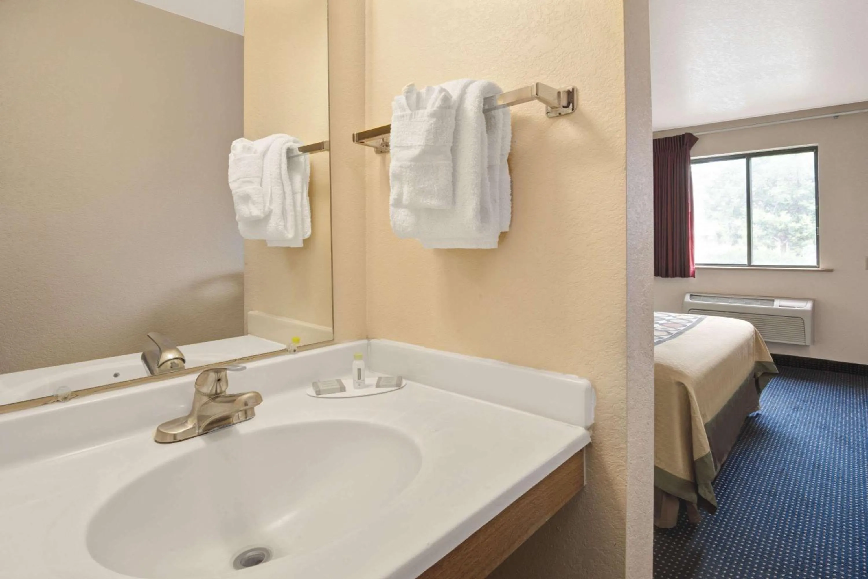 Bathroom in Super 8 by Wyndham Albuquerque West/Coors Blvd
