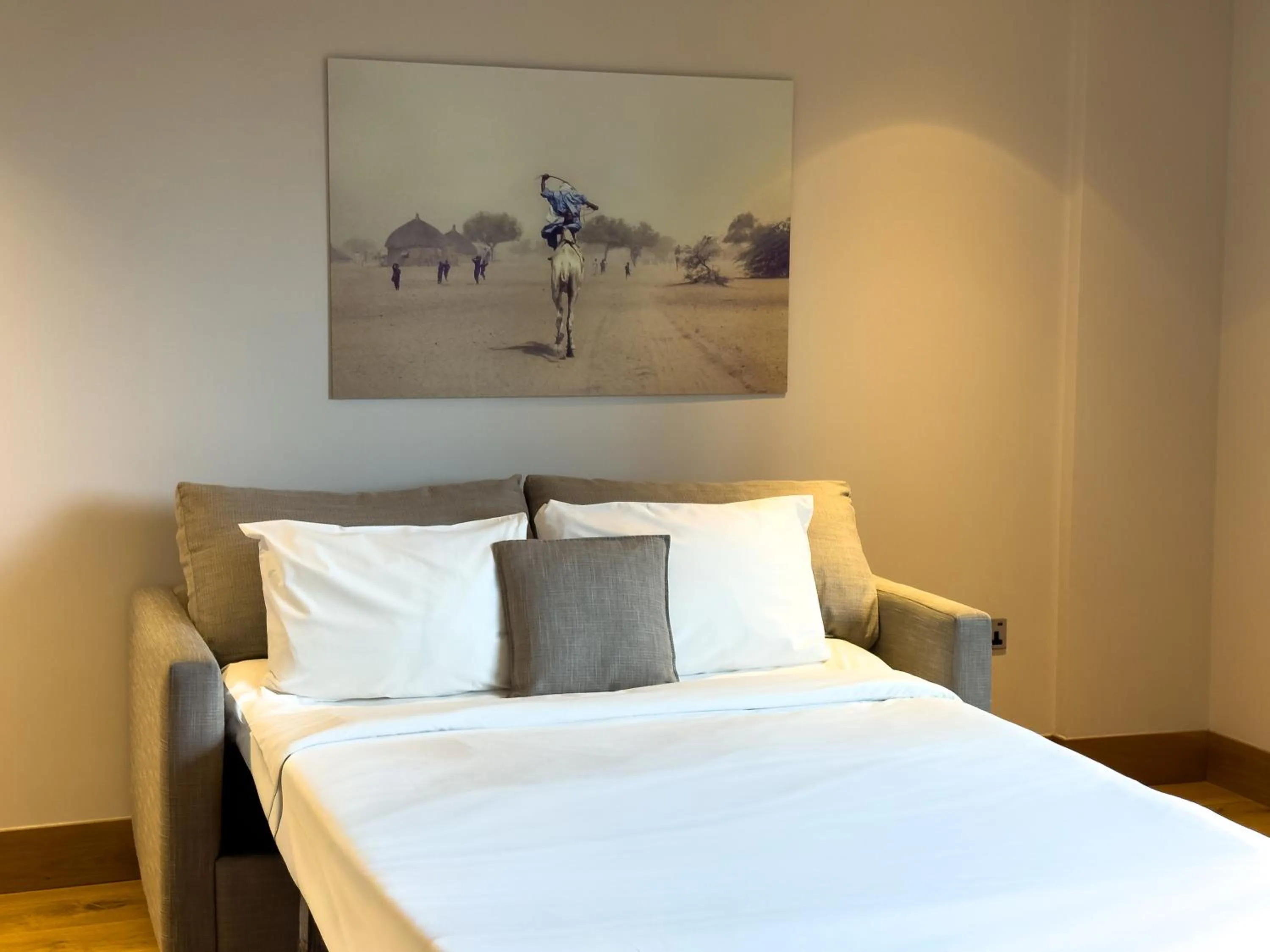 Living room, Bed in Tower Suites by Blue Orchid