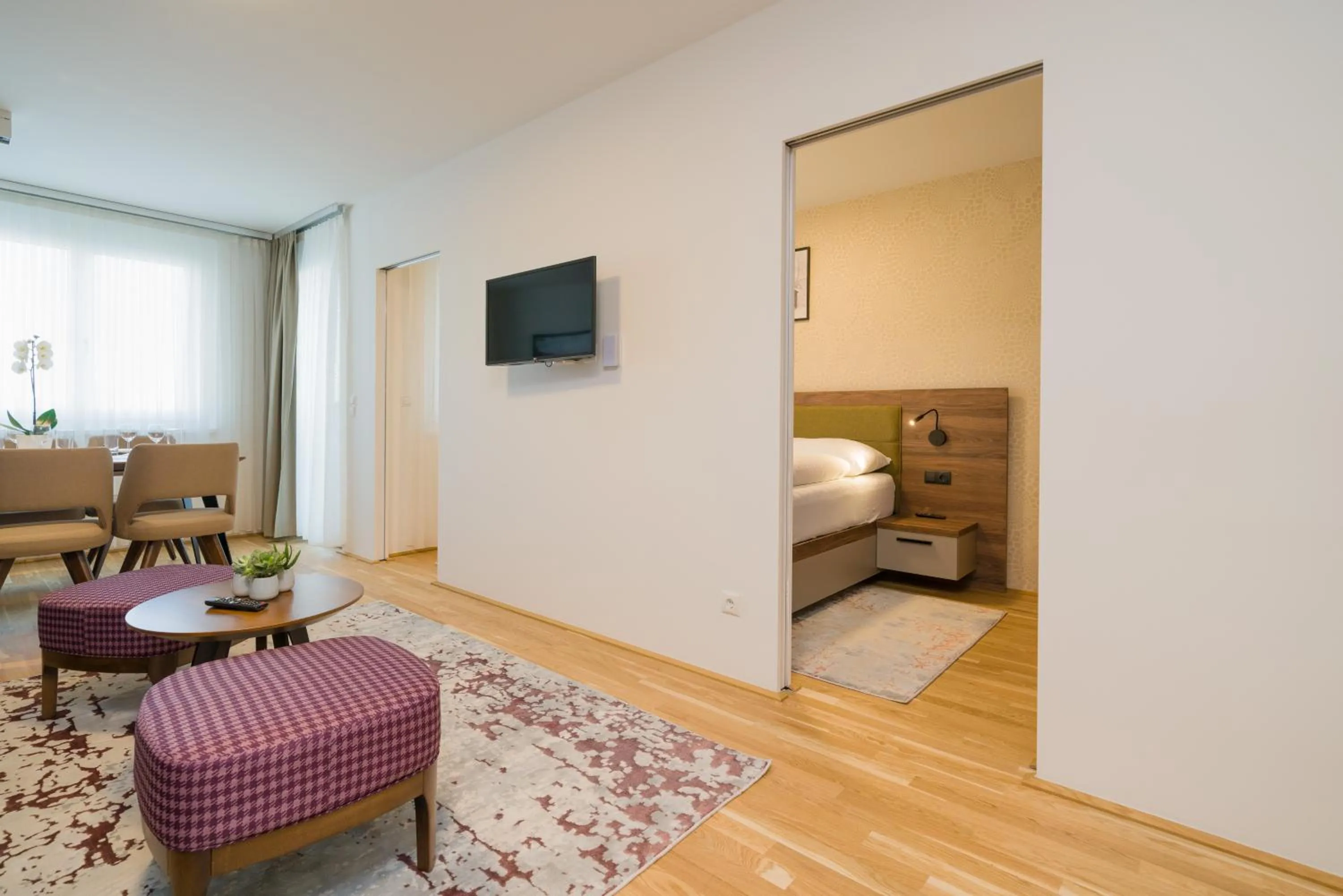 Communal lounge/ TV room, Bed in MyApartments Vienna