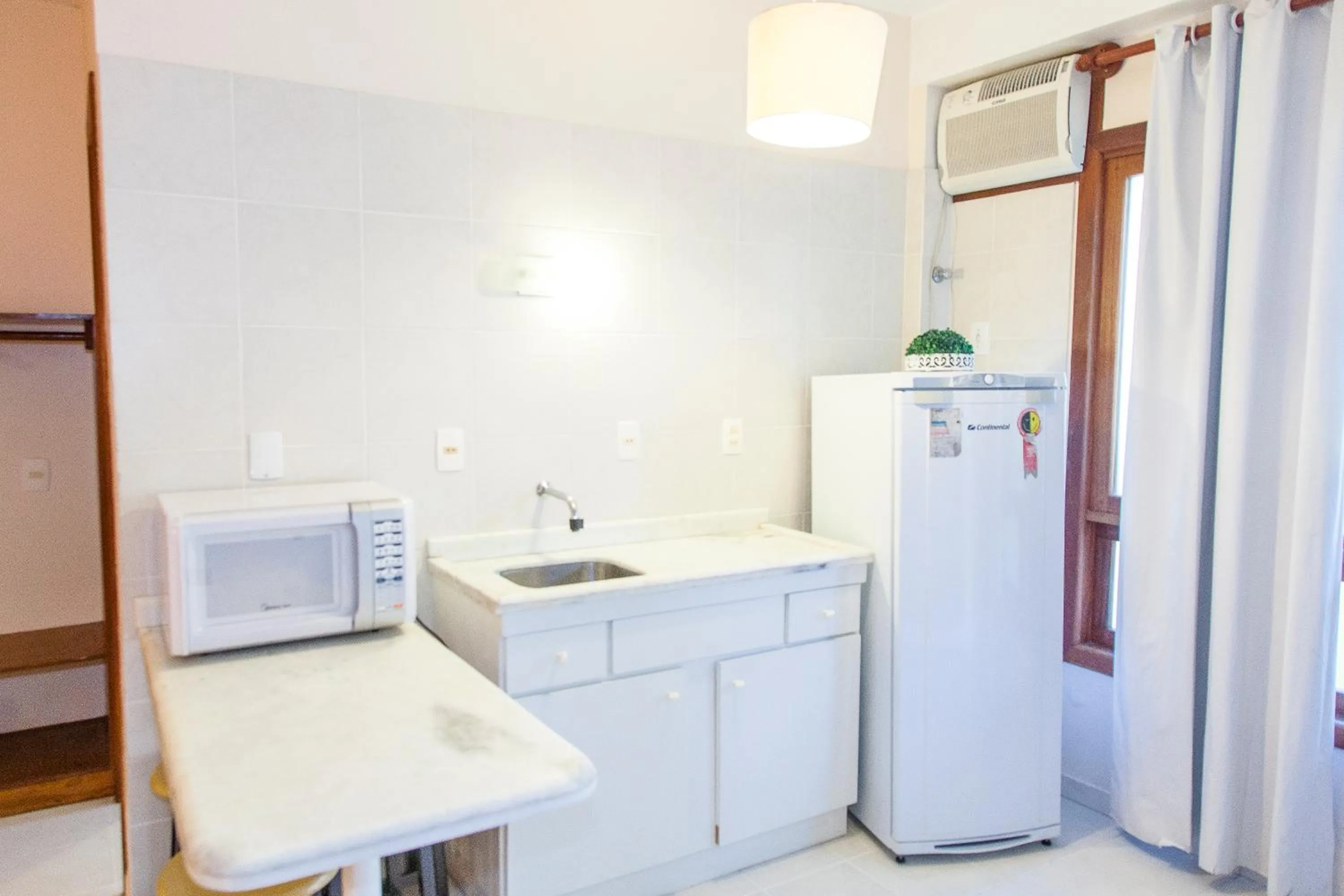 Kitchen or kitchenette in Hotel Fênix