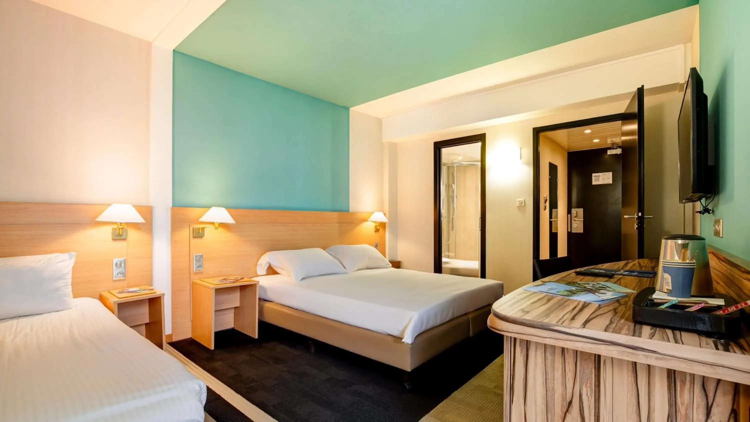 Triple Room (1 Double Bed + 1 Single Bed) in Kyriad Montbeliard Sochaux Triple Room (1 Double Bed + 1 Single Bed) in Kyriad Montbeliard Sochaux