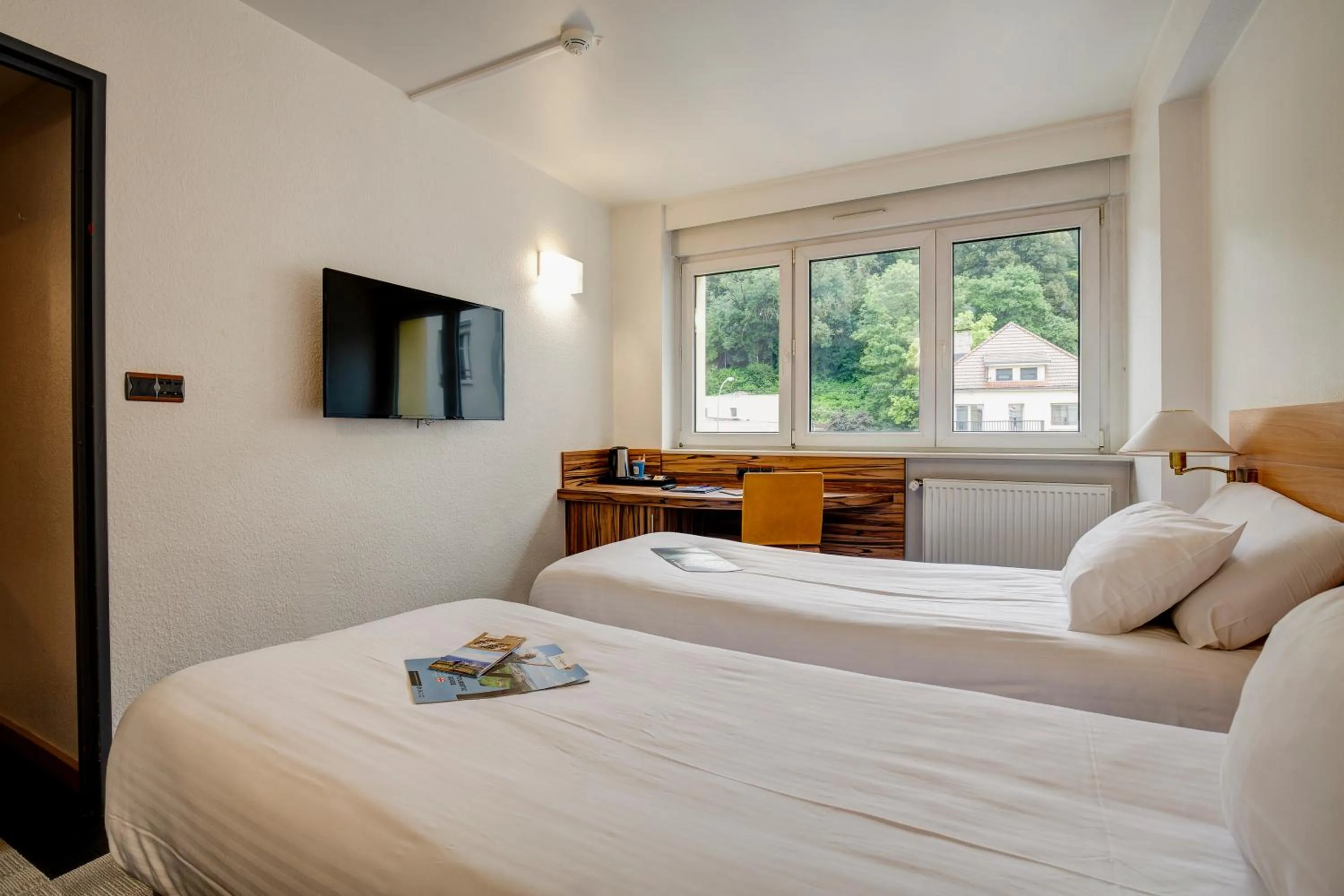 Bed in Kyriad Montbeliard Sochaux