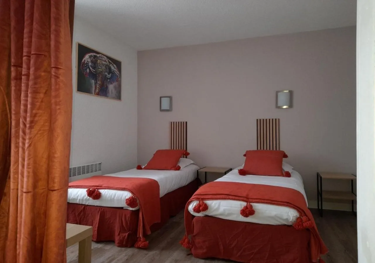 Bed in Les Jardins de L'Ocean - Climatisé