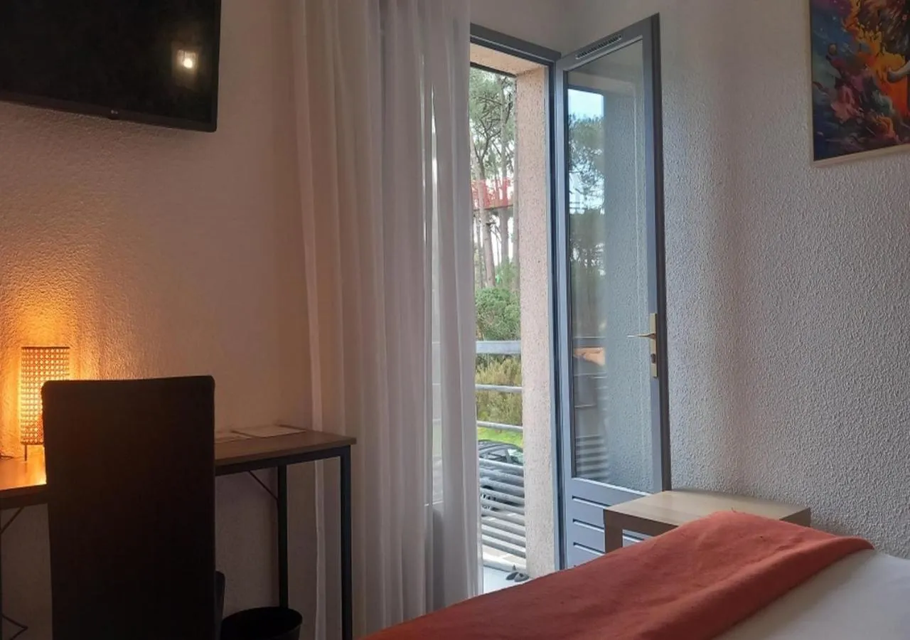 Bed in Les Jardins de L'Ocean - Climatisé