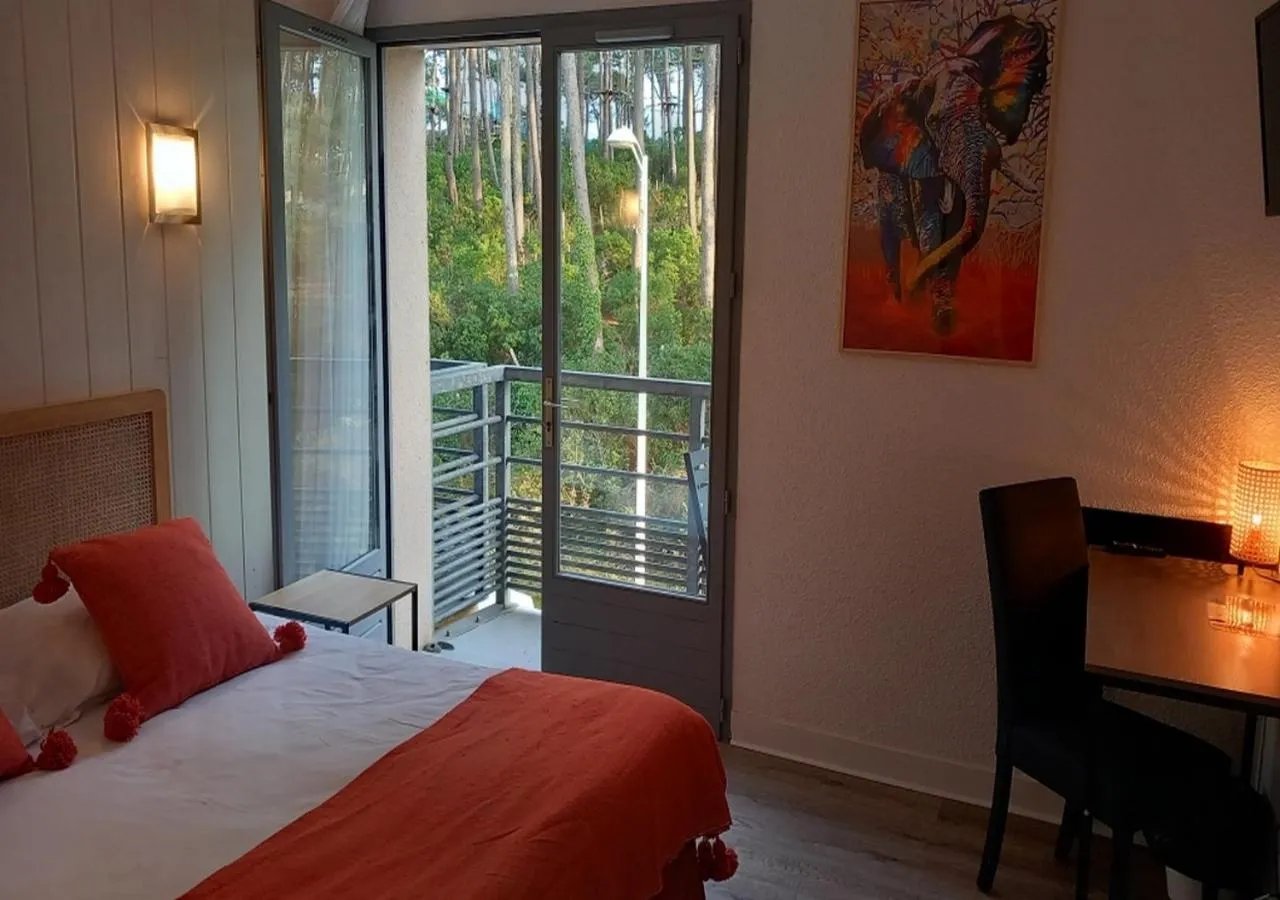 Bed in Les Jardins de L'Ocean - Climatisé