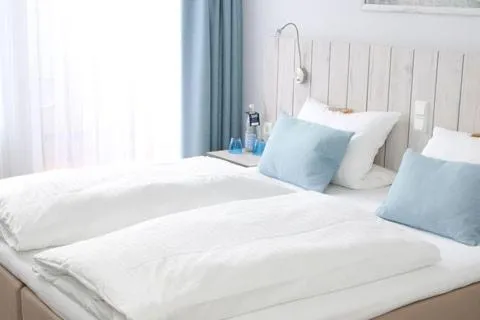 Bed in MarC5 Hotel Cadenberge