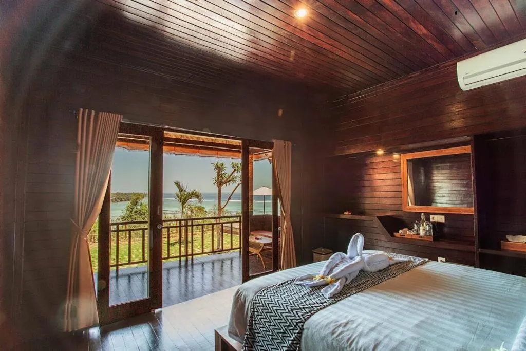 Bed in Ocean Paradise Cottage