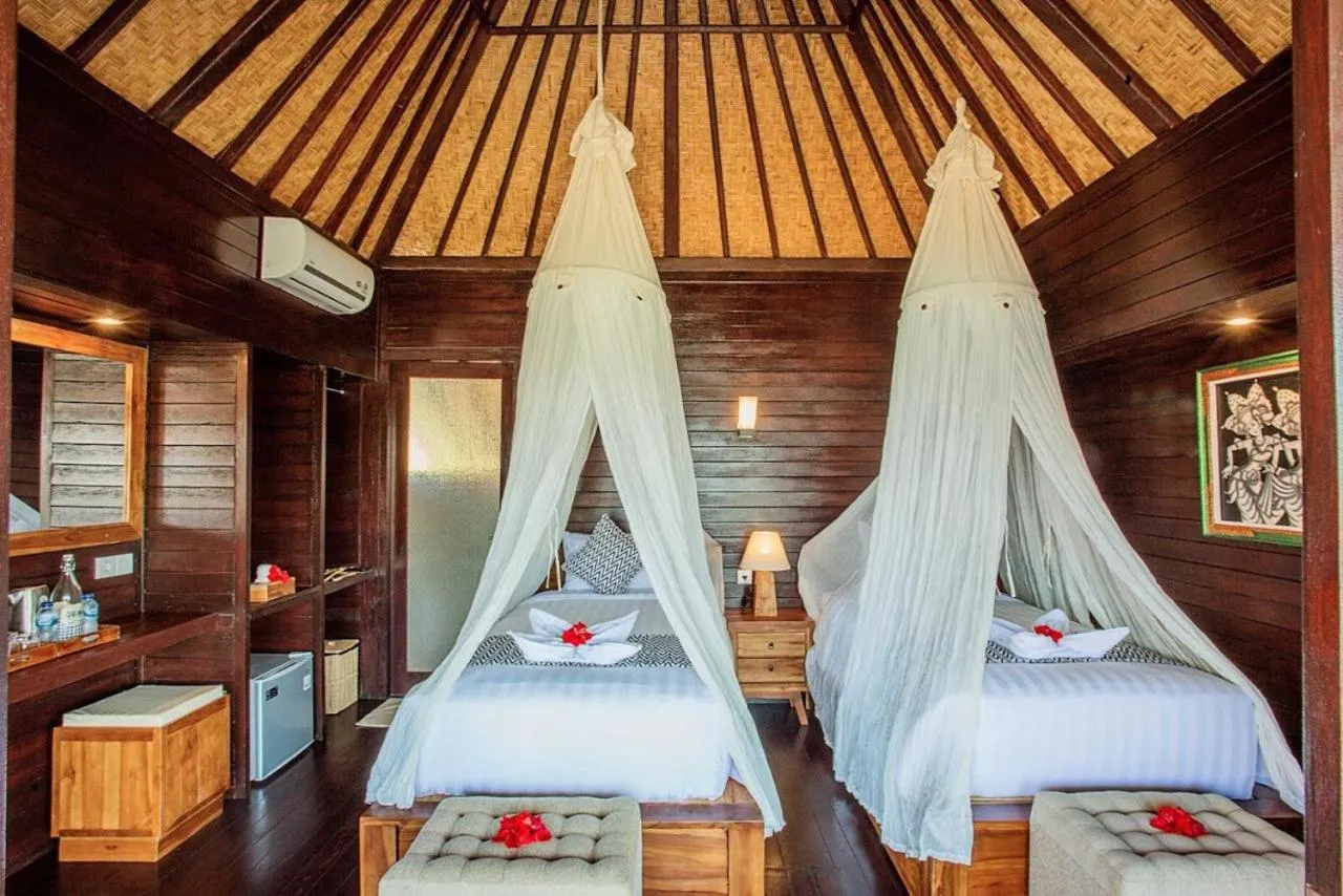 Bed in Ocean Paradise Cottage