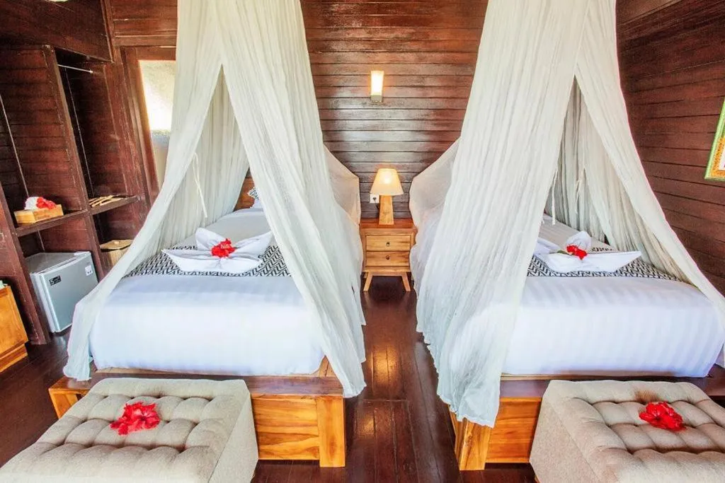 Bed in Ocean Paradise Cottage