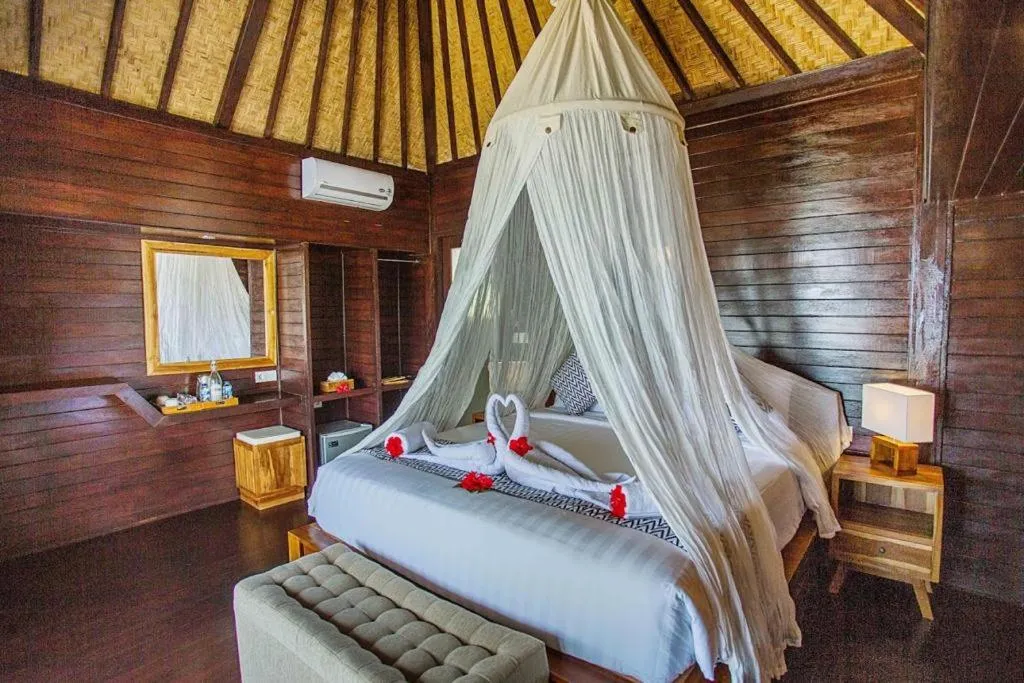 Bed in Ocean Paradise Cottage