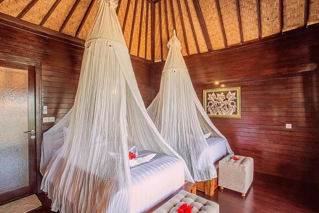 Bed in Ocean Paradise Cottage