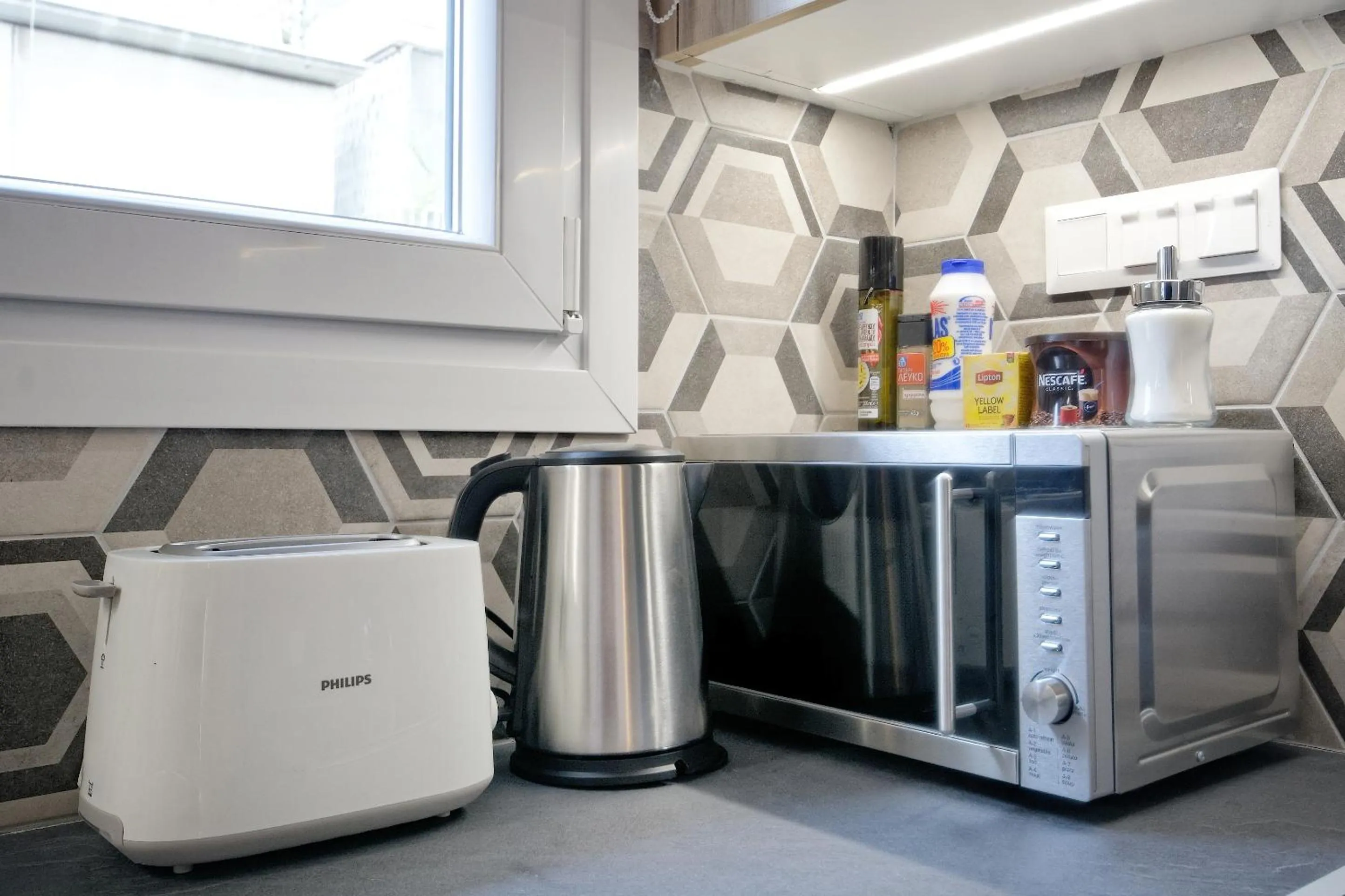 Coffee/tea facilities in Odyssey Residence