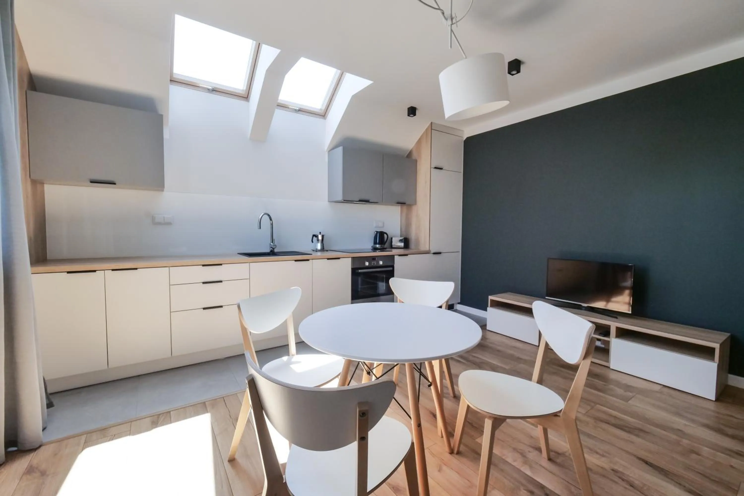 Kitchen or kitchenette in Apartamenty przy Winnicy