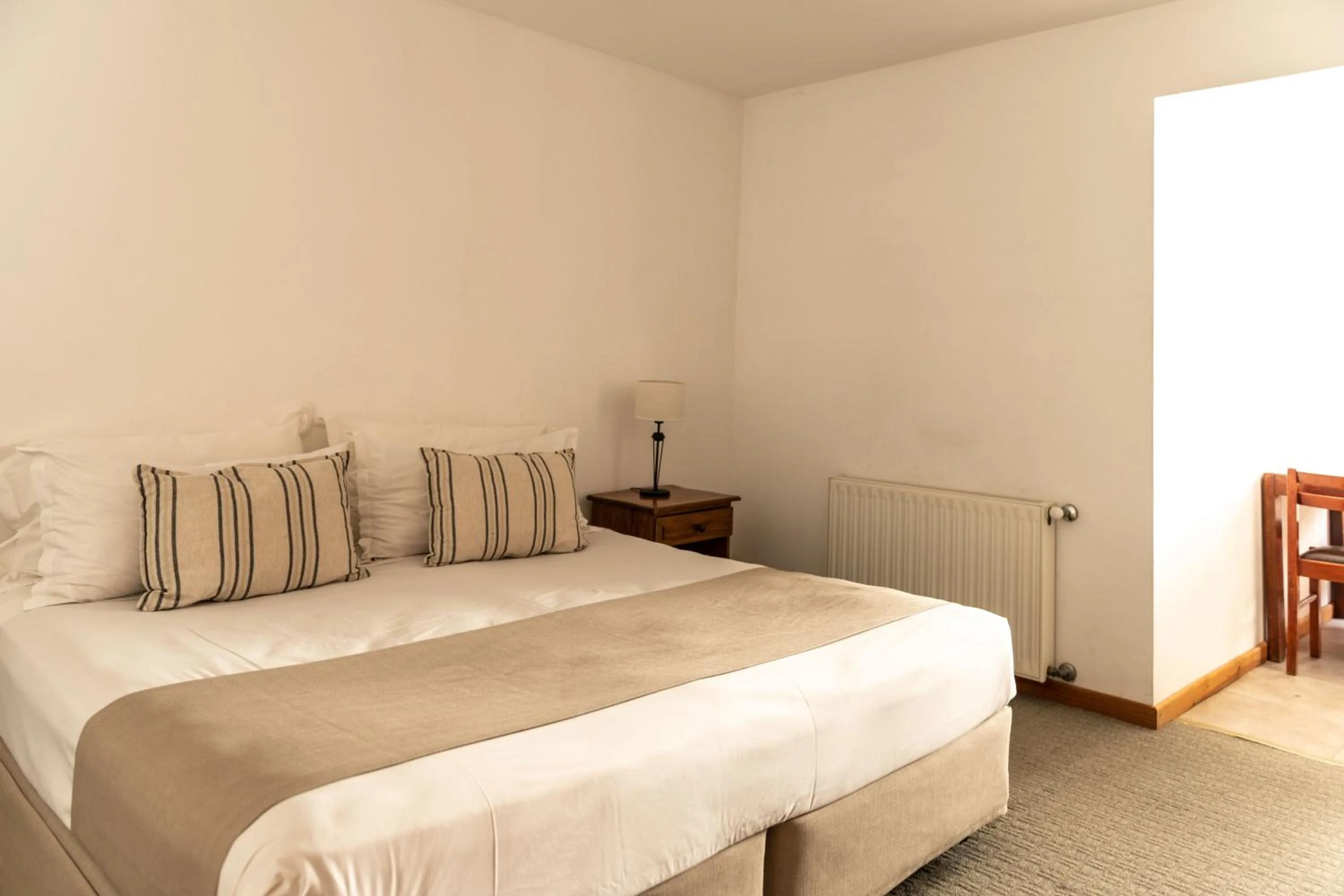 Bed in Hostería del Cerro