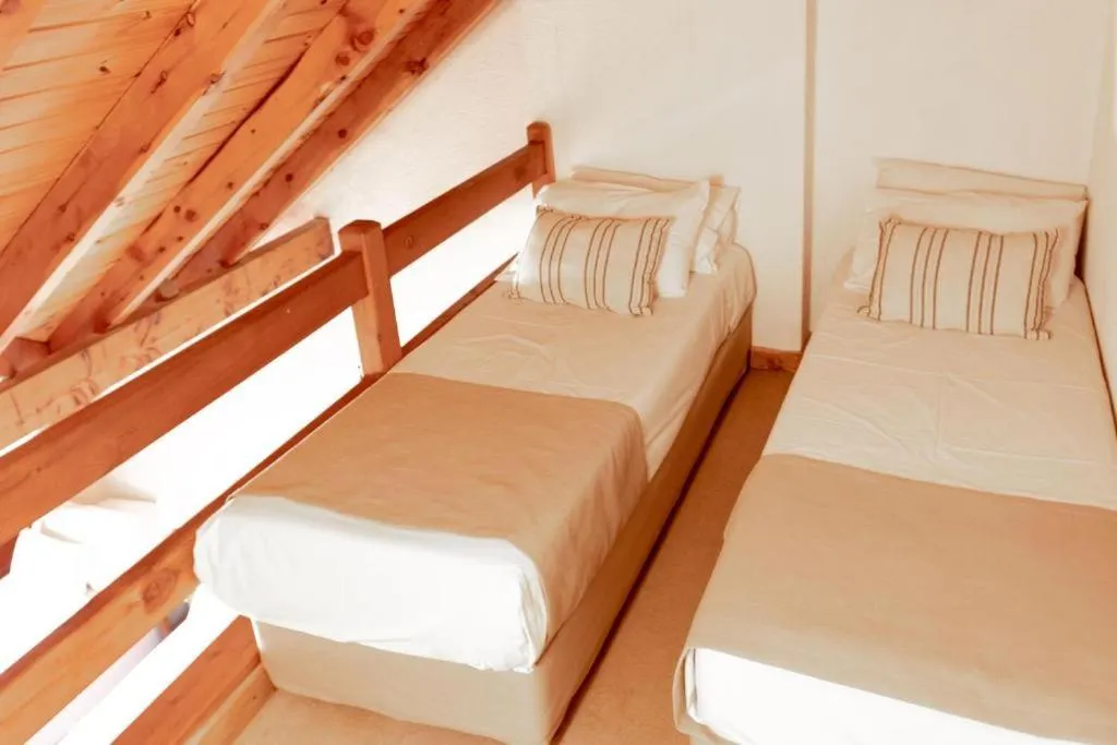 Bed in Hostería del Cerro