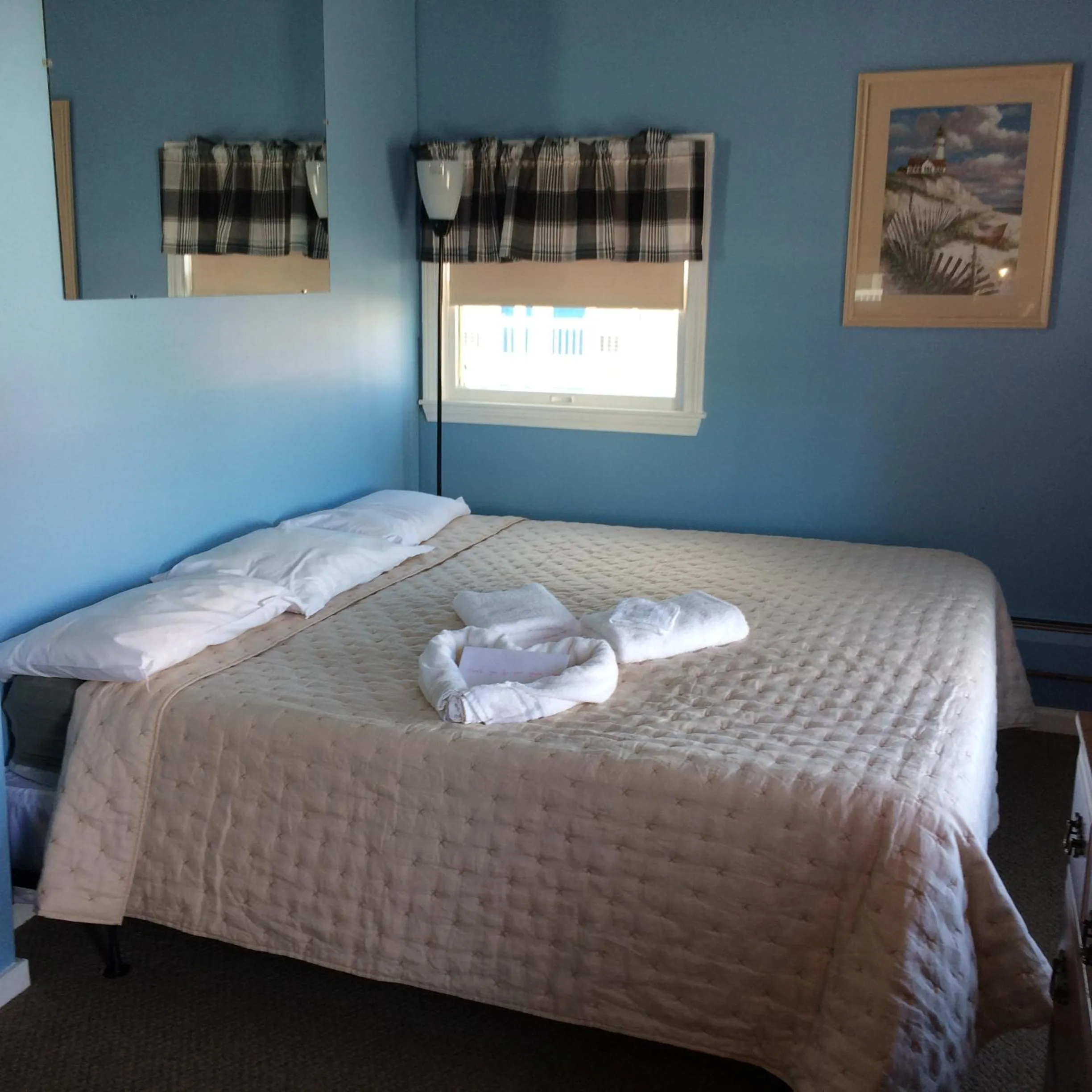 Bed in The New Oceanic Inn