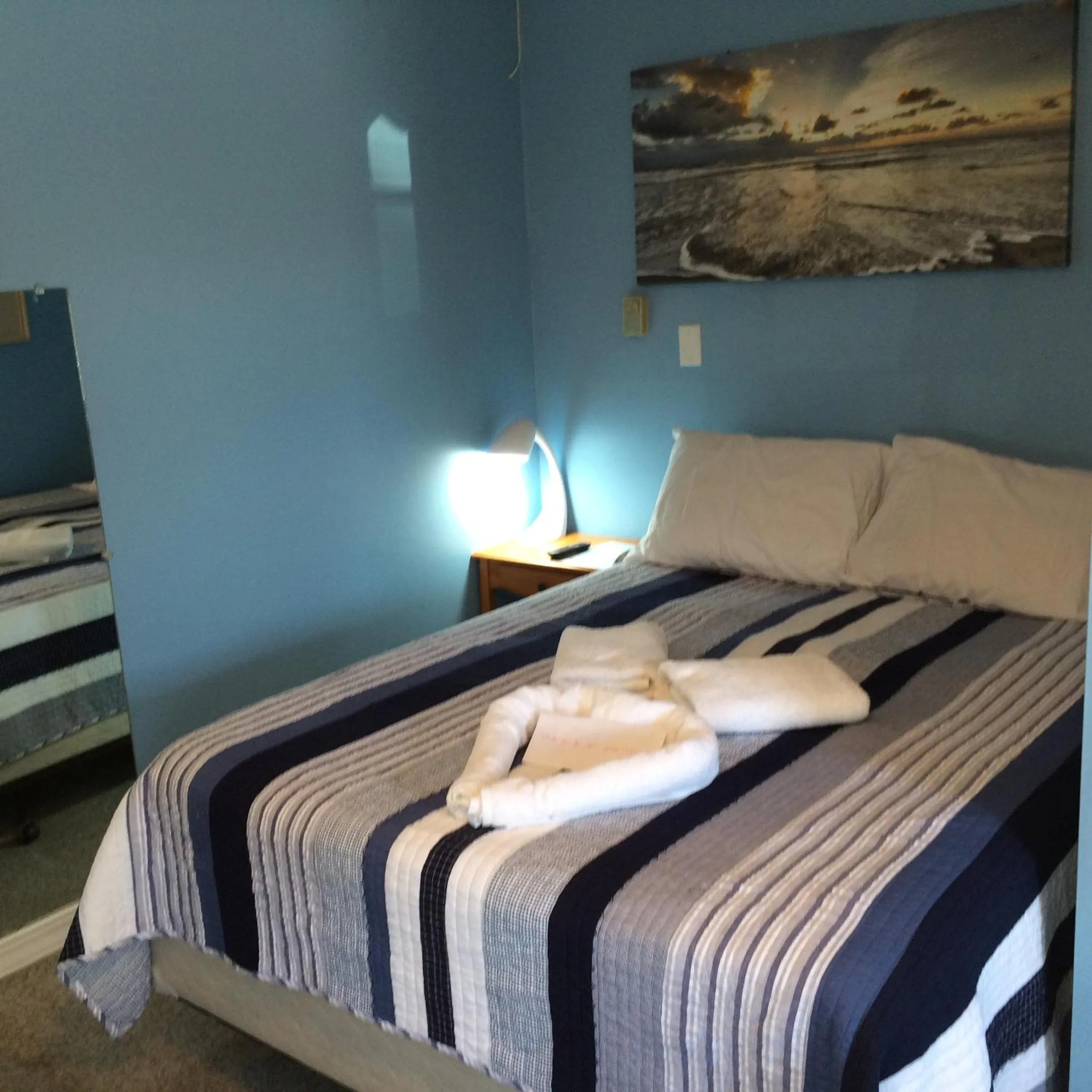 Bed in The New Oceanic Inn
