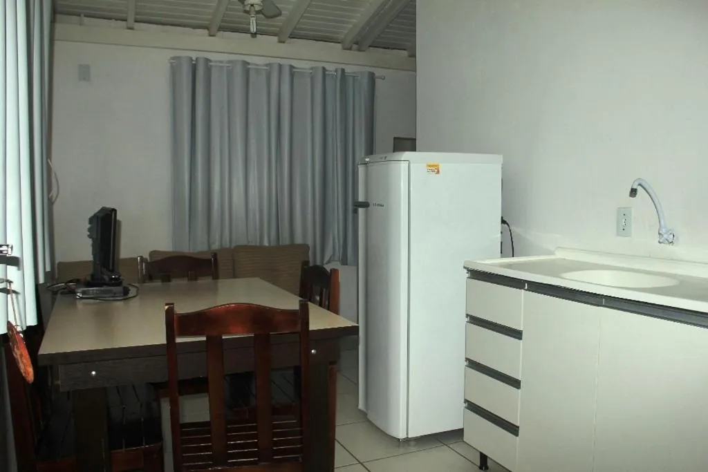 Dining area in Pousada Residencial Família Dragone
