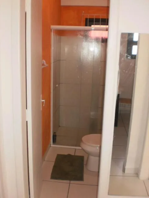 Toilet in Pousada Residencial Família Dragone