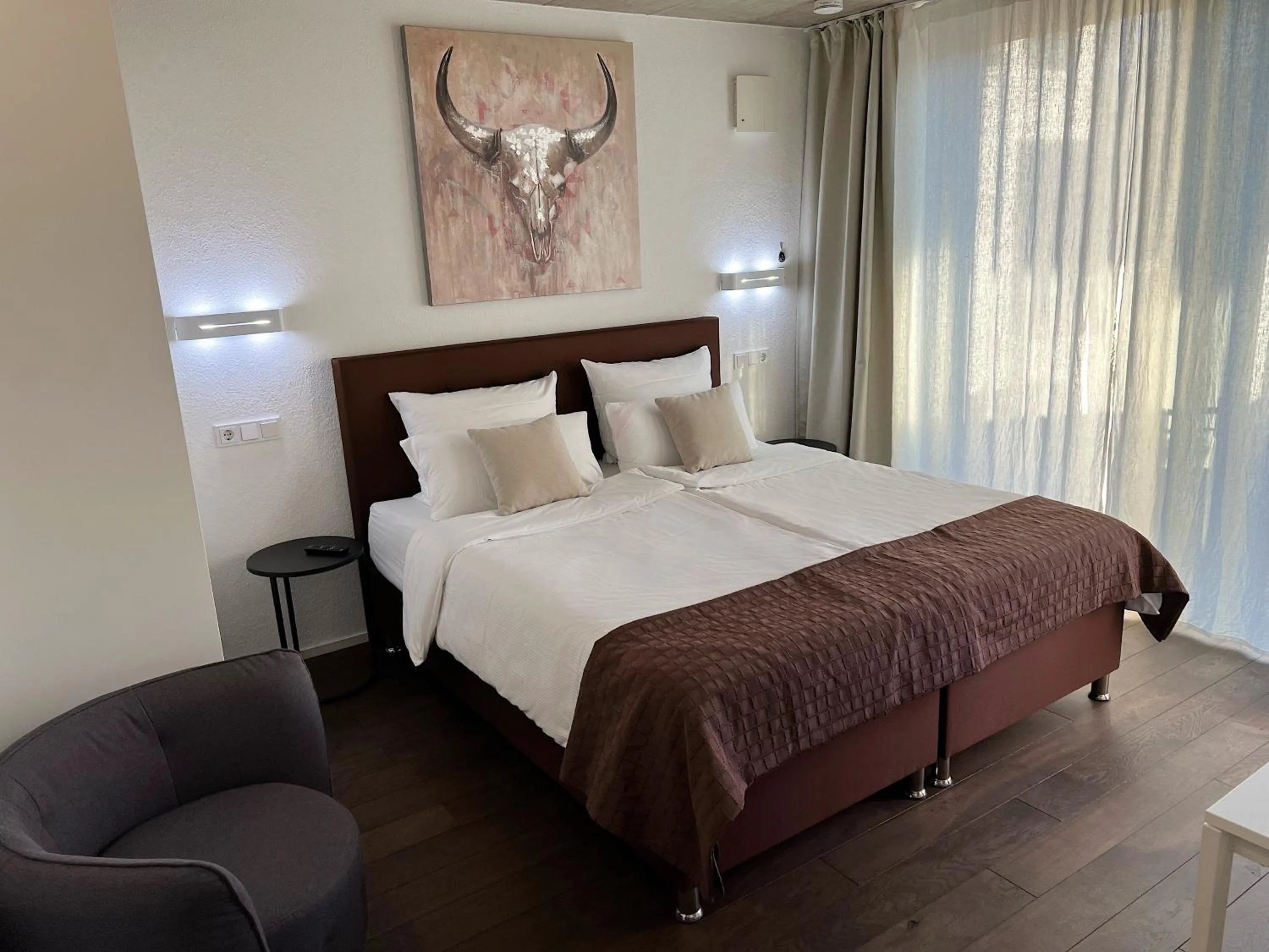 Bed in Weingut-Aparthotel Olinger