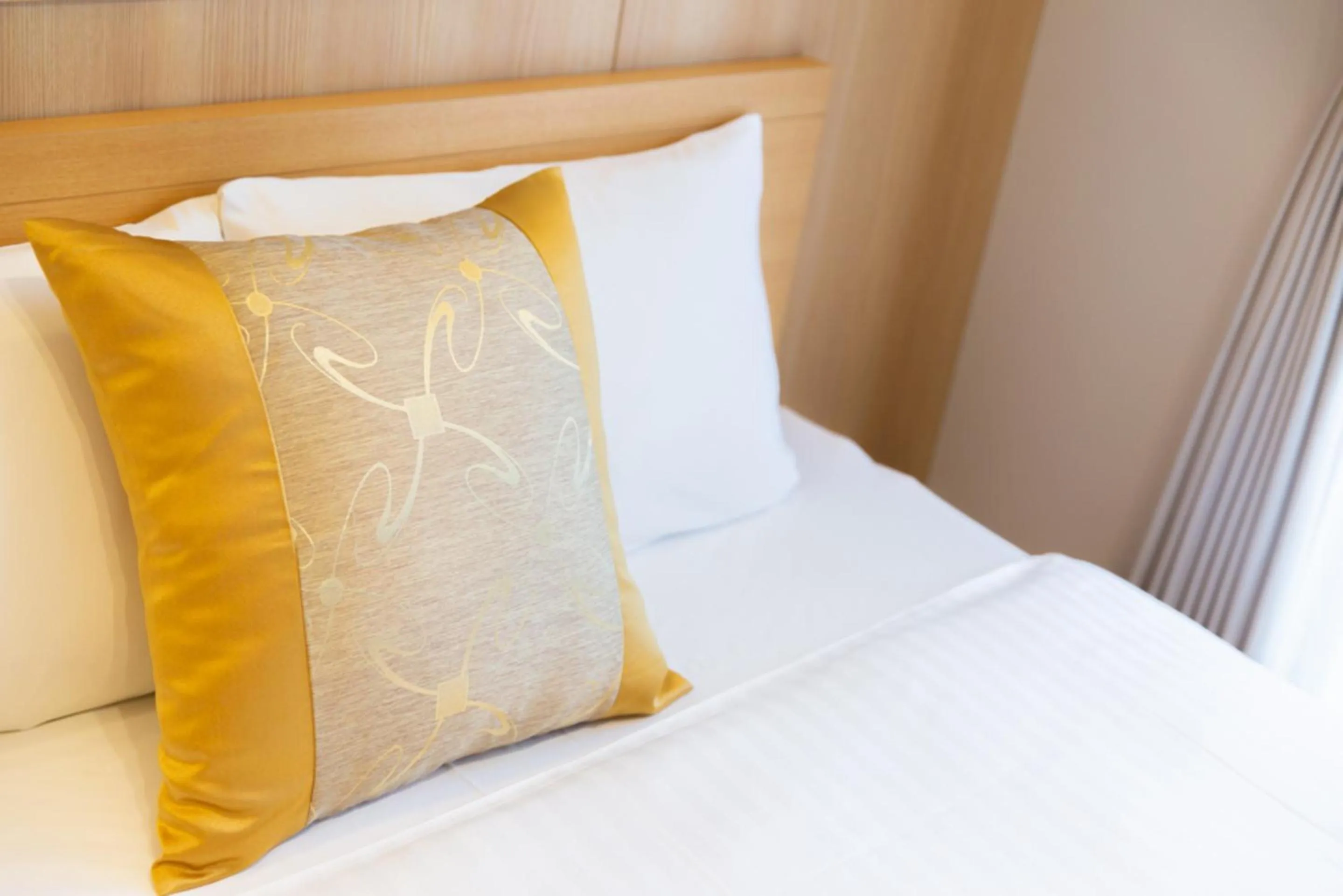 Bed in GRAND BASE Hiroshima Hikarimachi