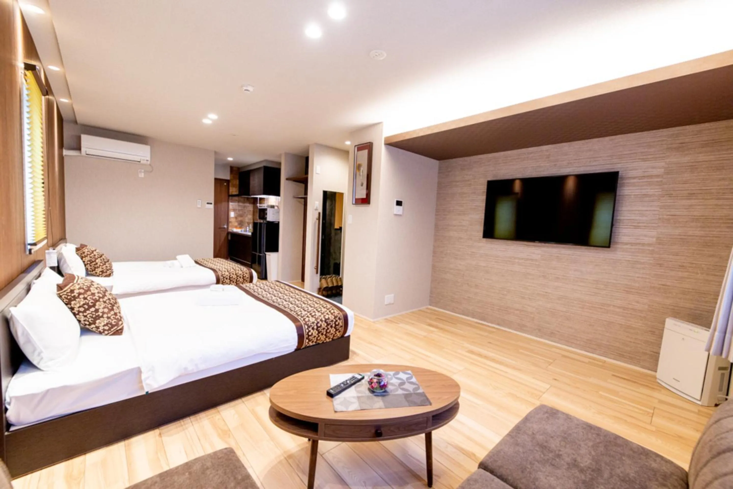 Photo of the whole room, Bed in GRAND BASE Hiroshima Hikarimachi