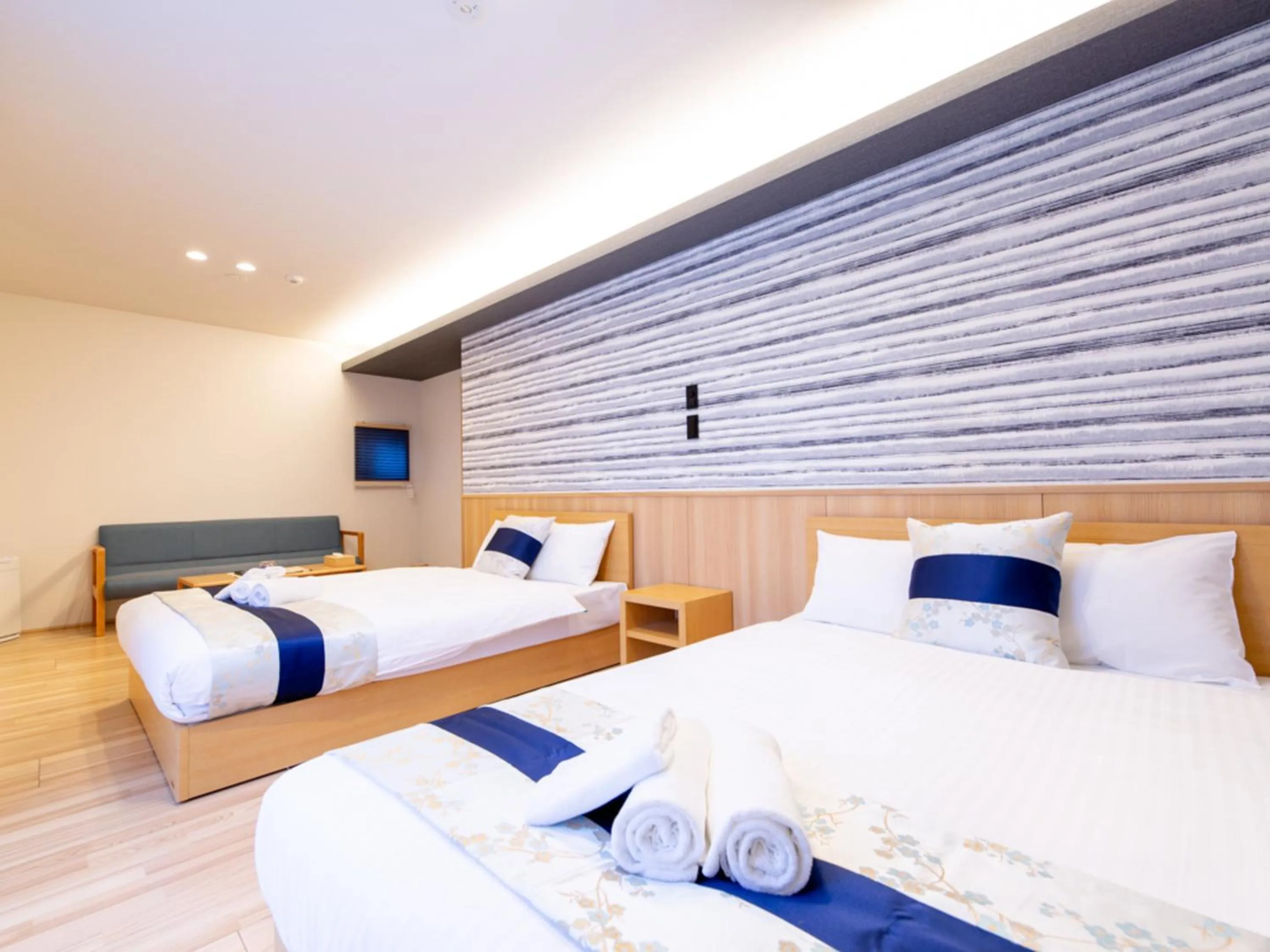 Bed in GRAND BASE Hiroshima Hikarimachi