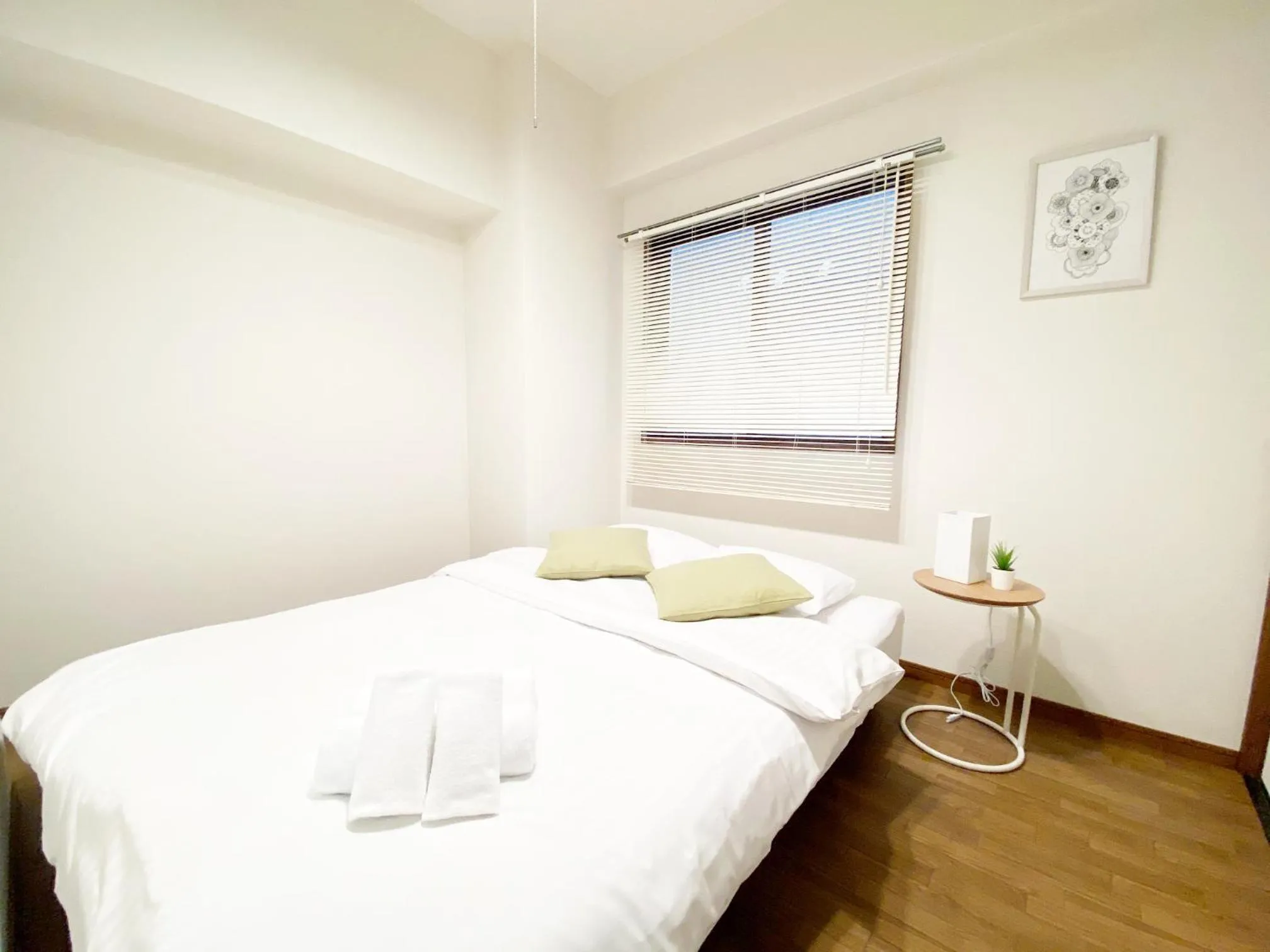 Bed in OUCHI HOTEL Dambara