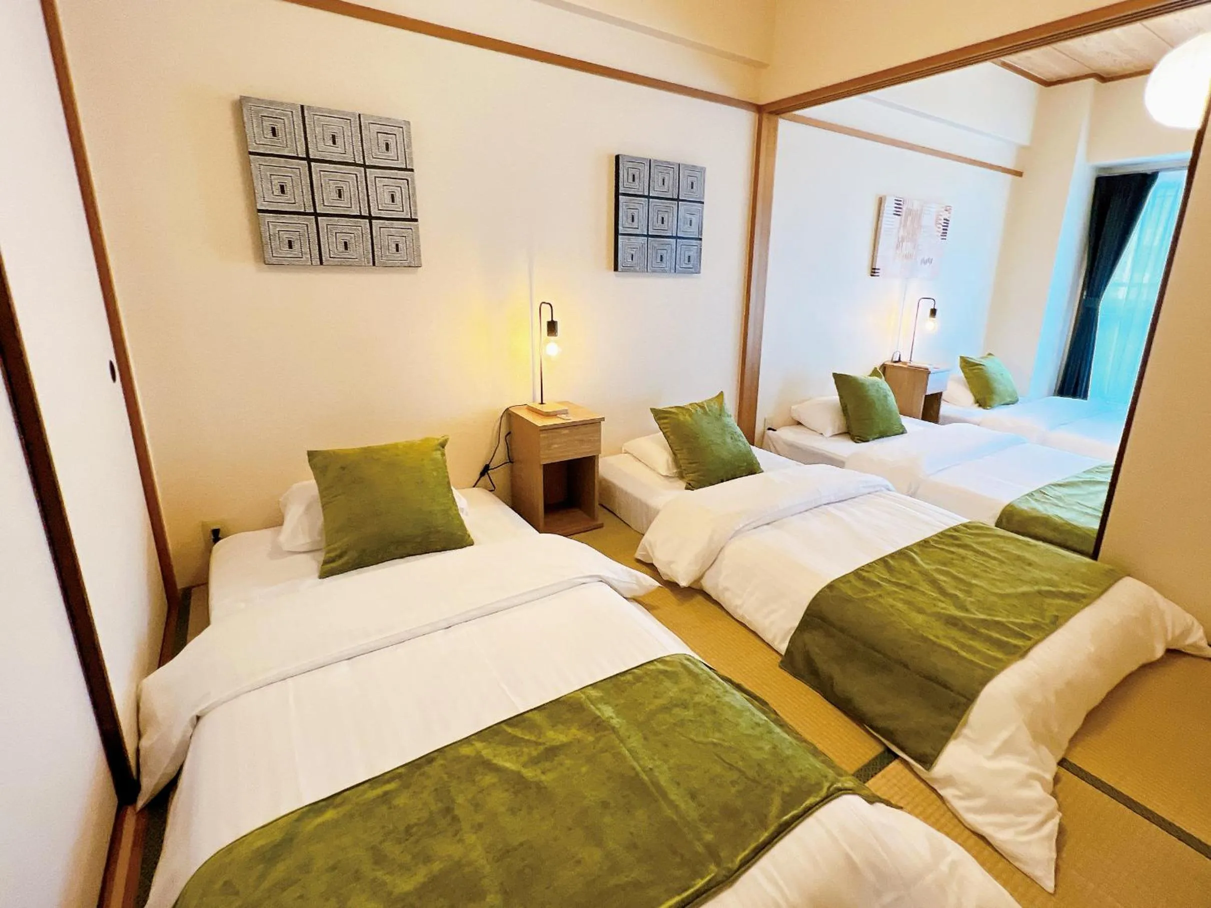 Bed in OUCHI HOTEL Dambara