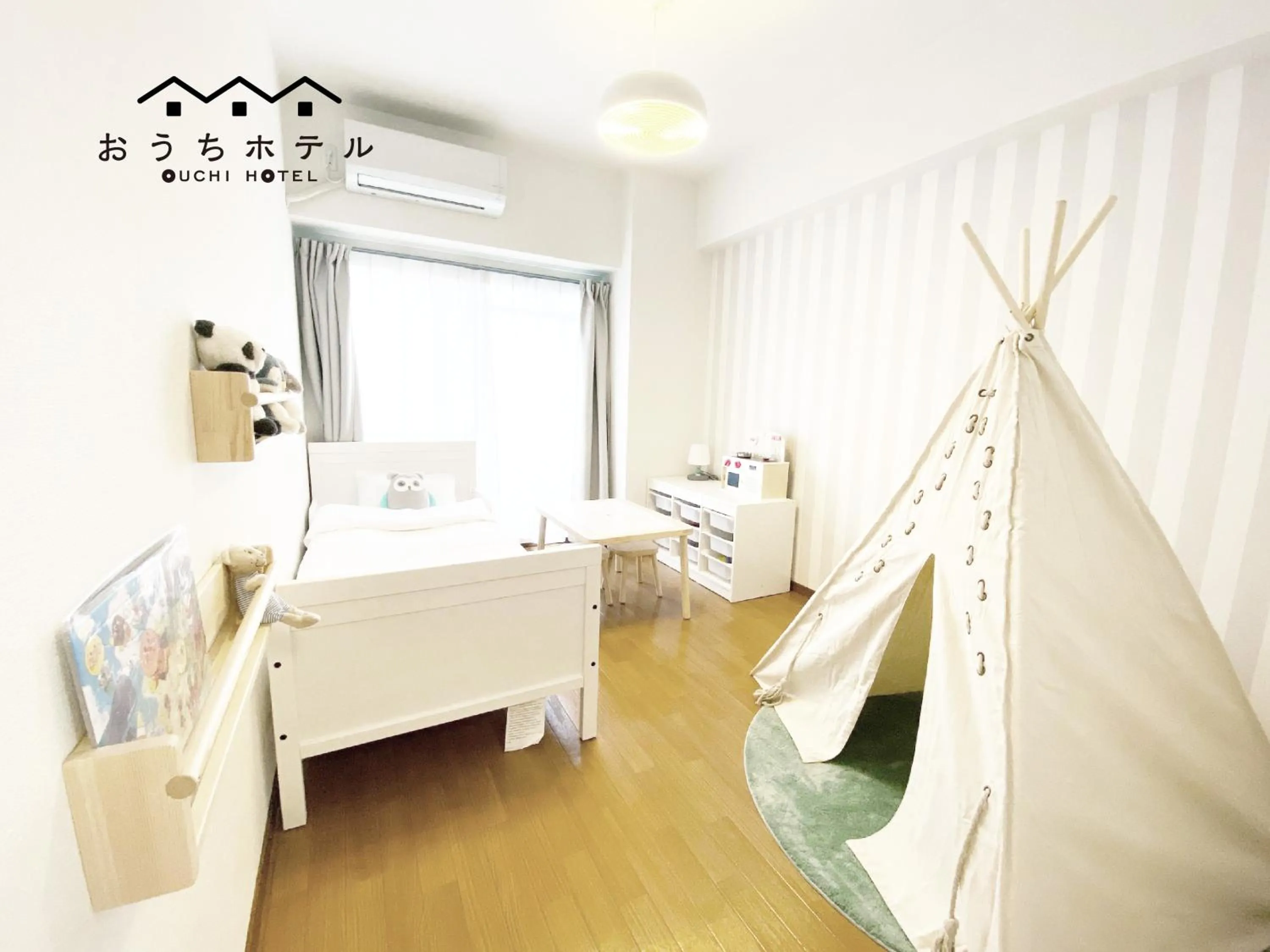 Bed in OUCHI HOTEL Dambara