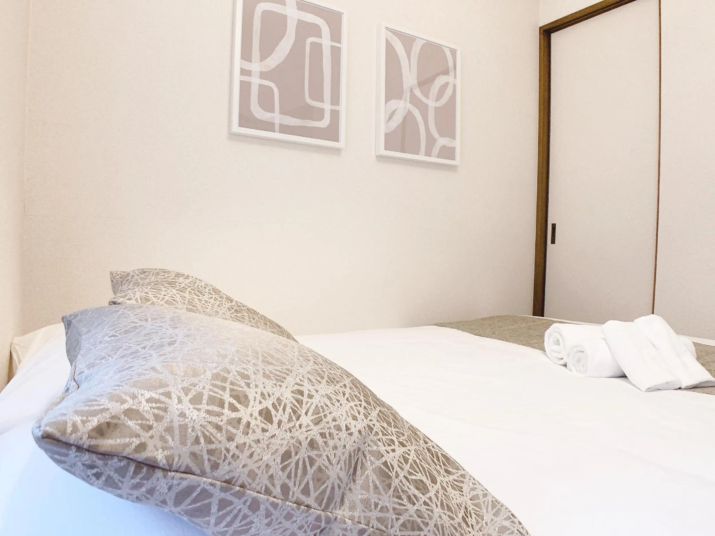 Bed in OUCHI HOTEL Dambara