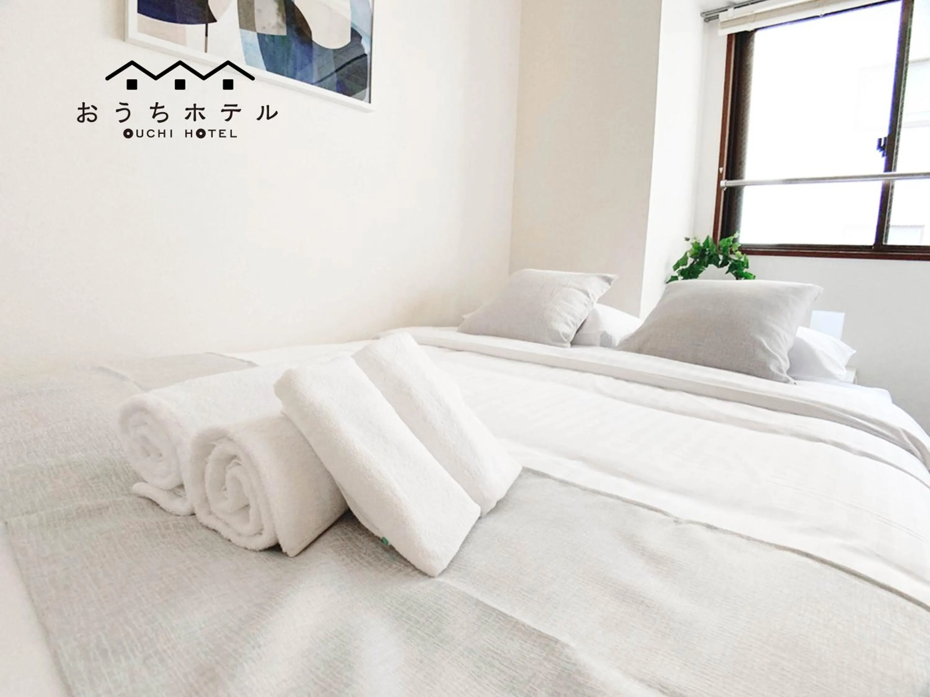 Bed in OUCHI HOTEL Dambara