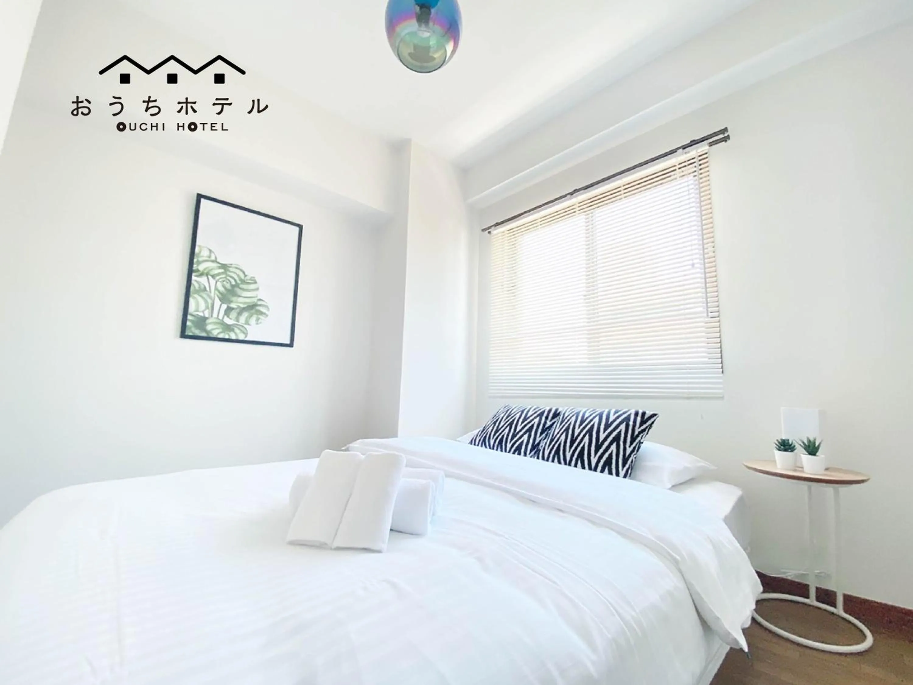 Bed in OUCHI HOTEL Dambara