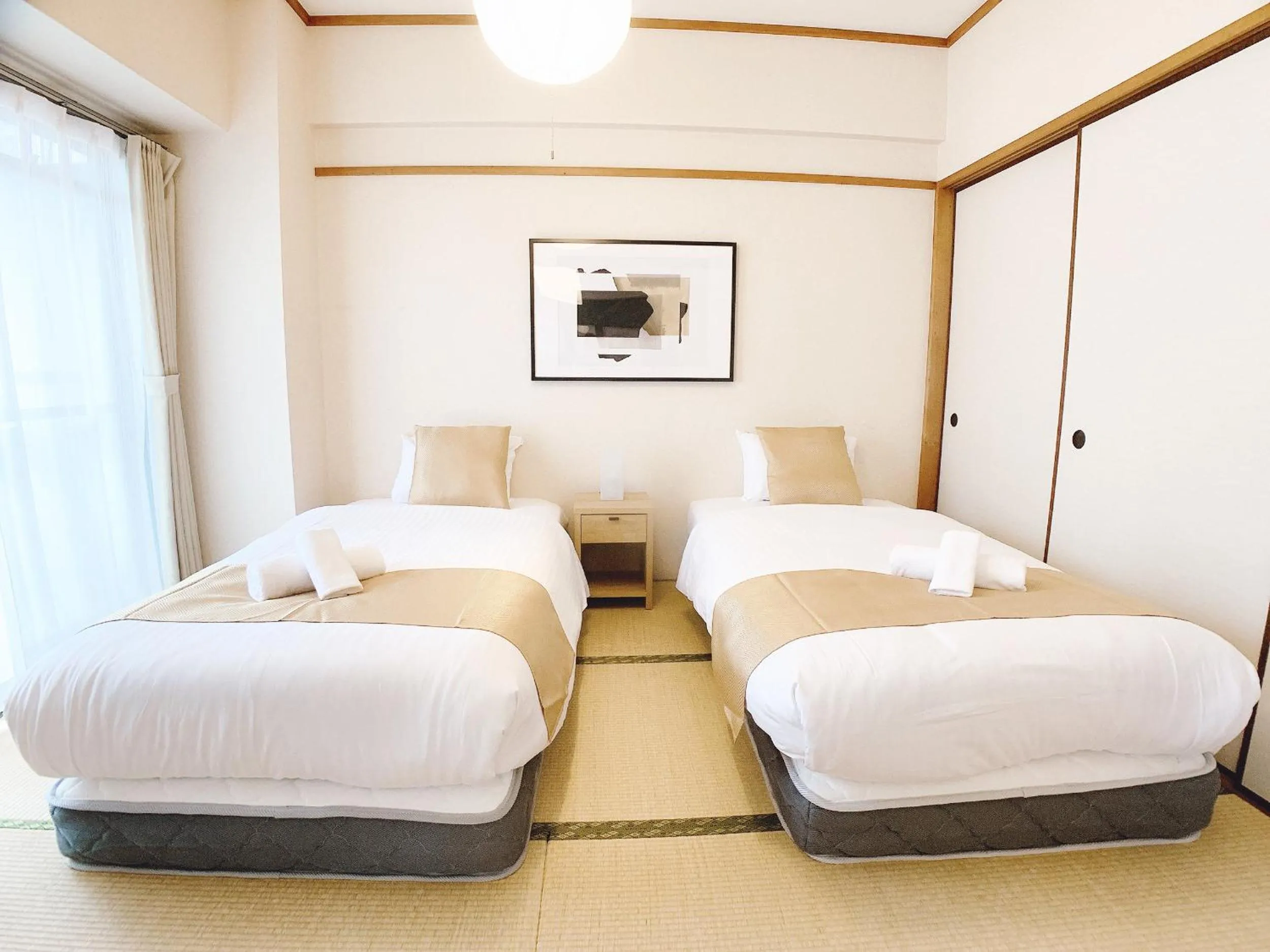 Bed in OUCHI HOTEL Dambara