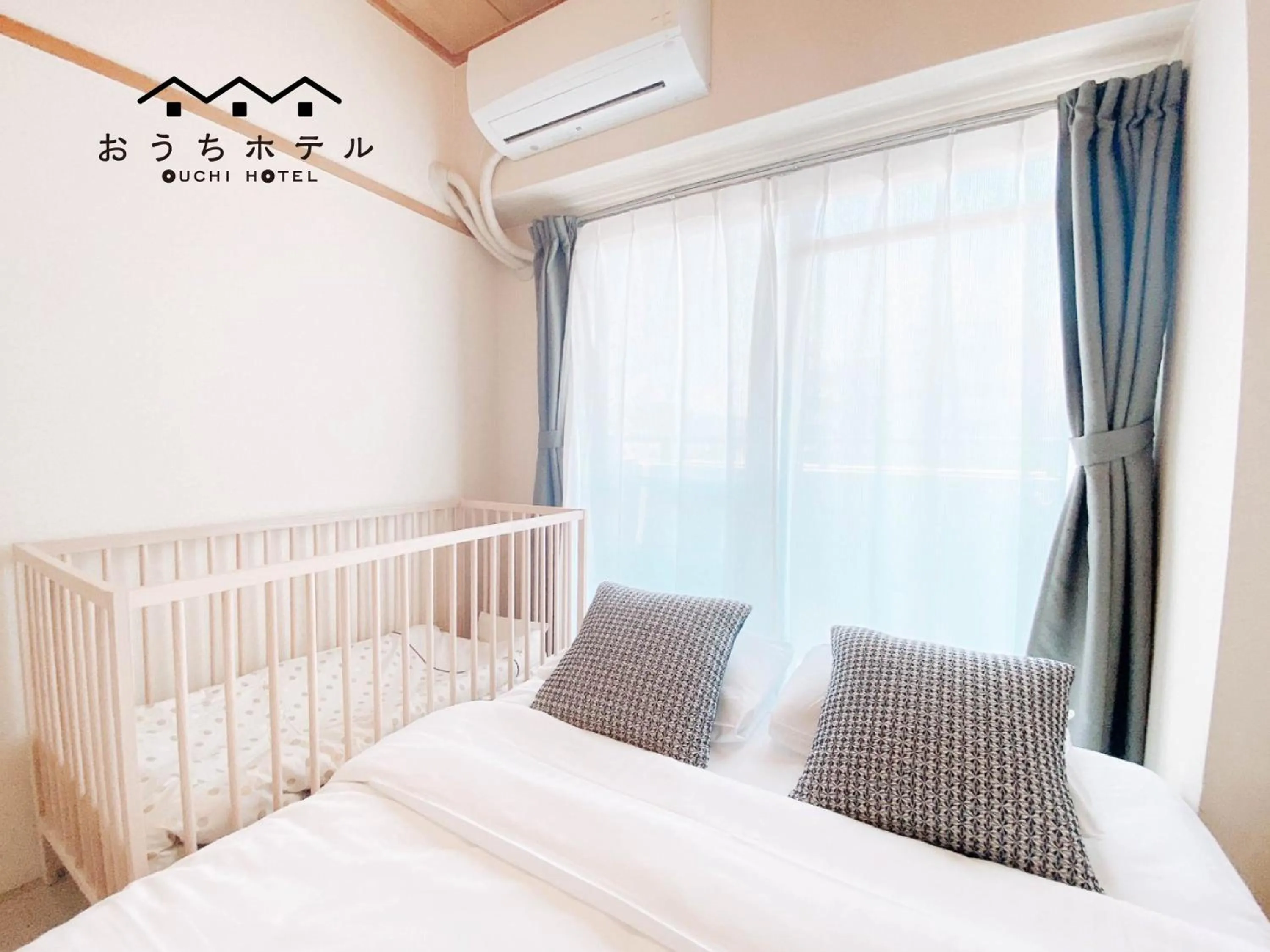 Bed in OUCHI HOTEL Dambara