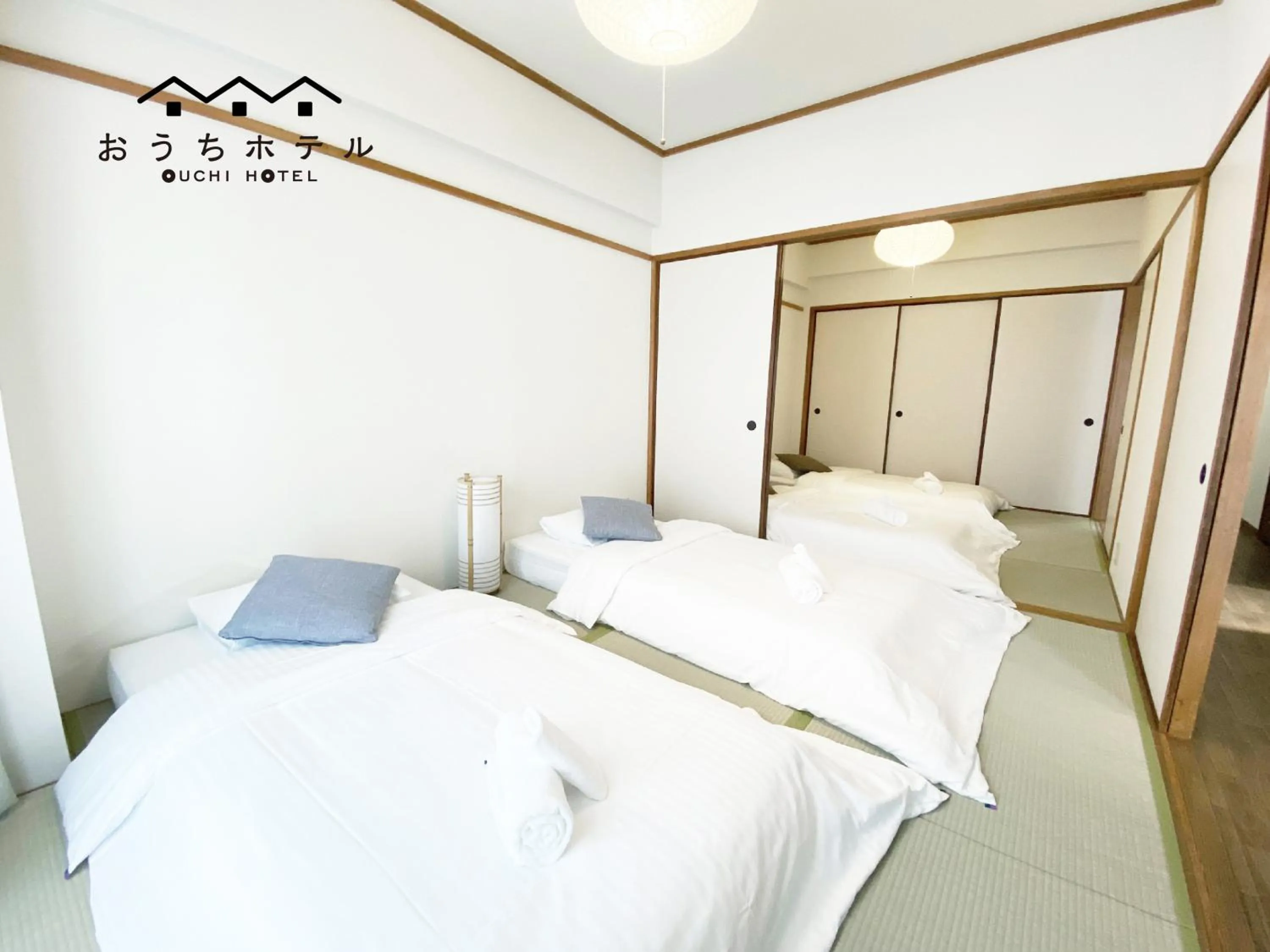 Bed in OUCHI HOTEL Dambara