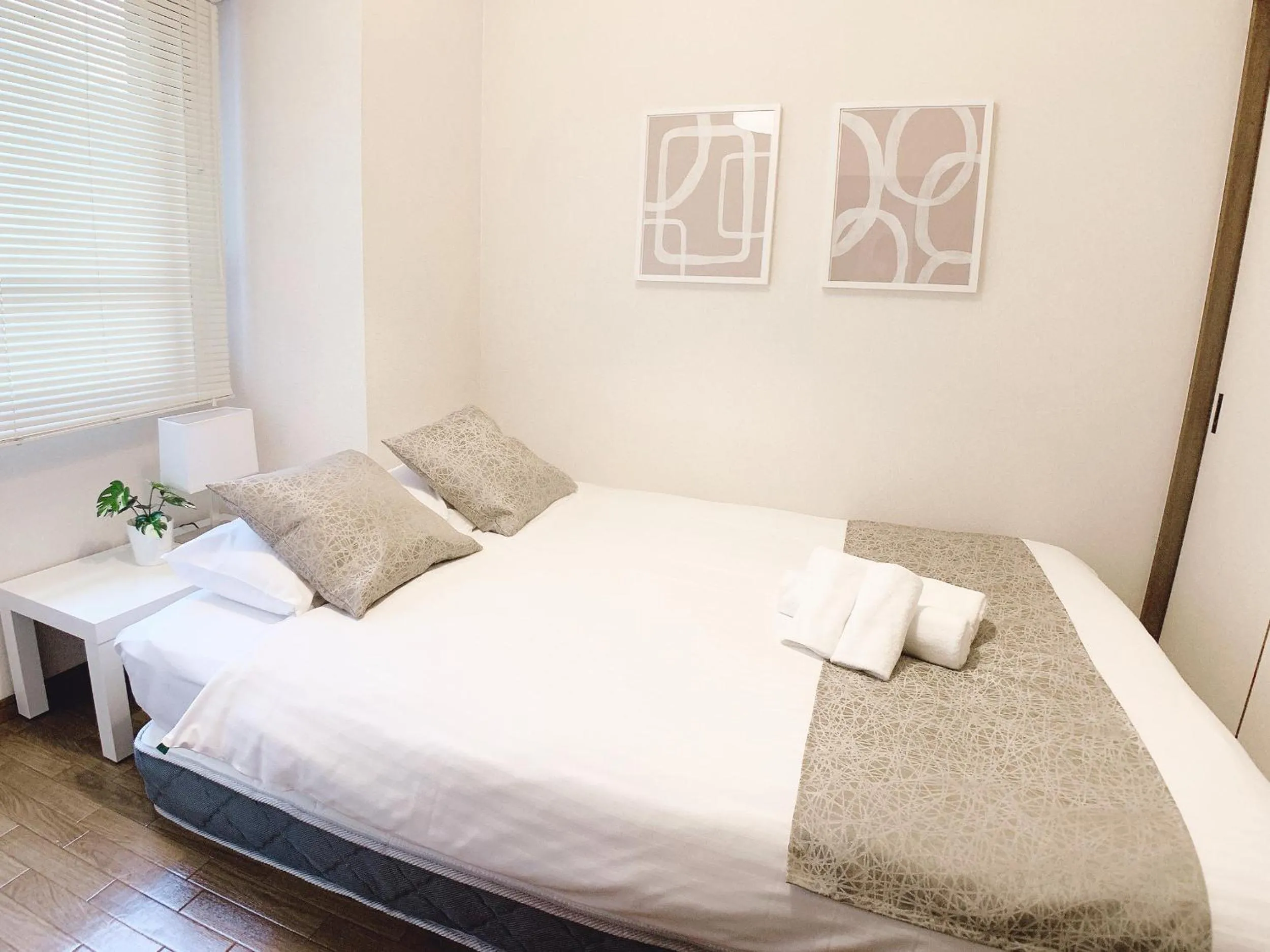 Bed in OUCHI HOTEL Dambara