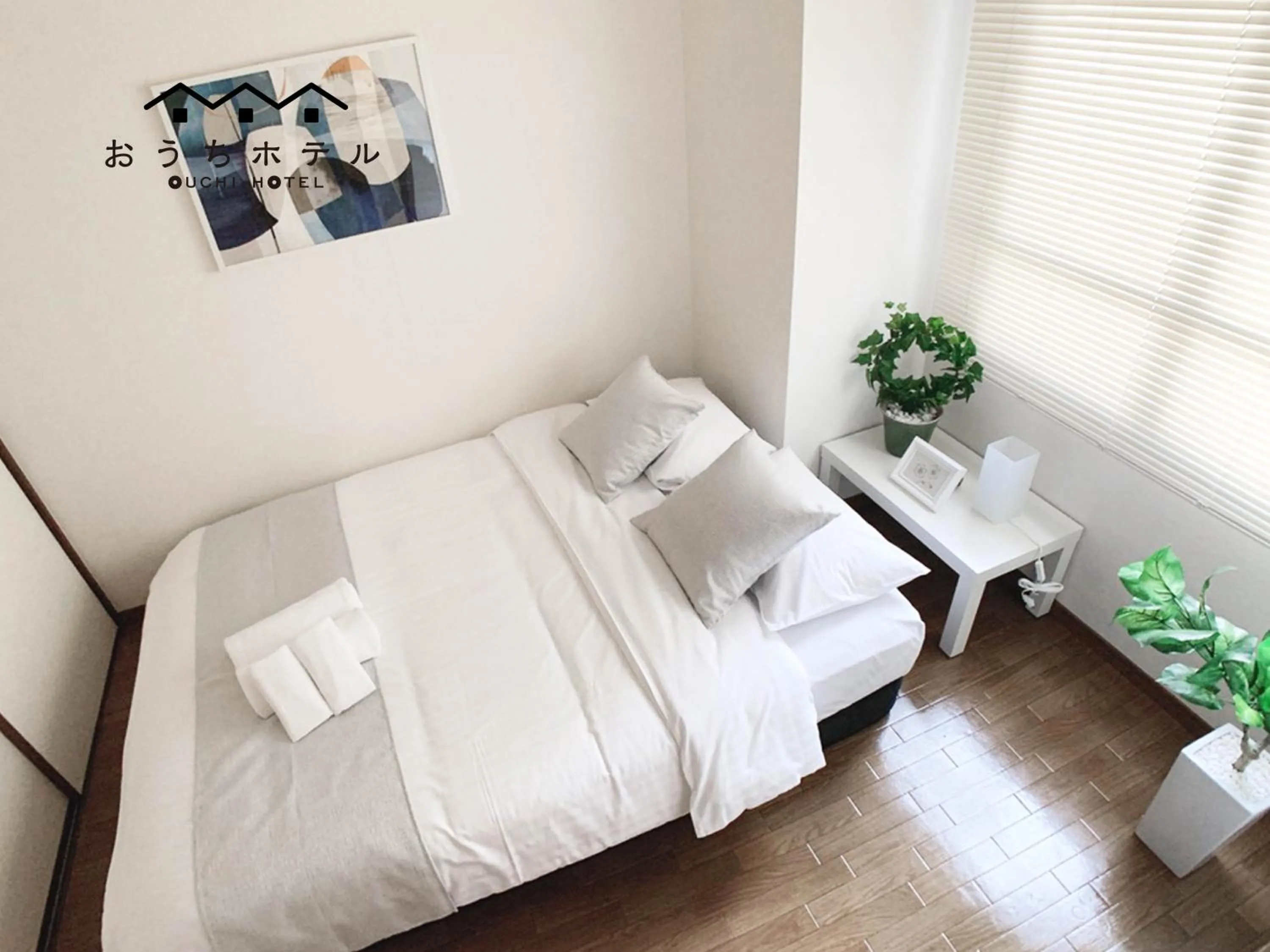 Bed in OUCHI HOTEL Dambara