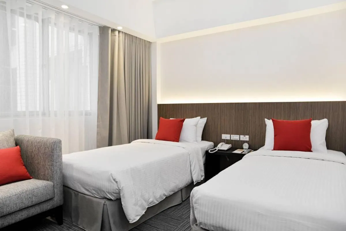 Bed in Emperor Hotel