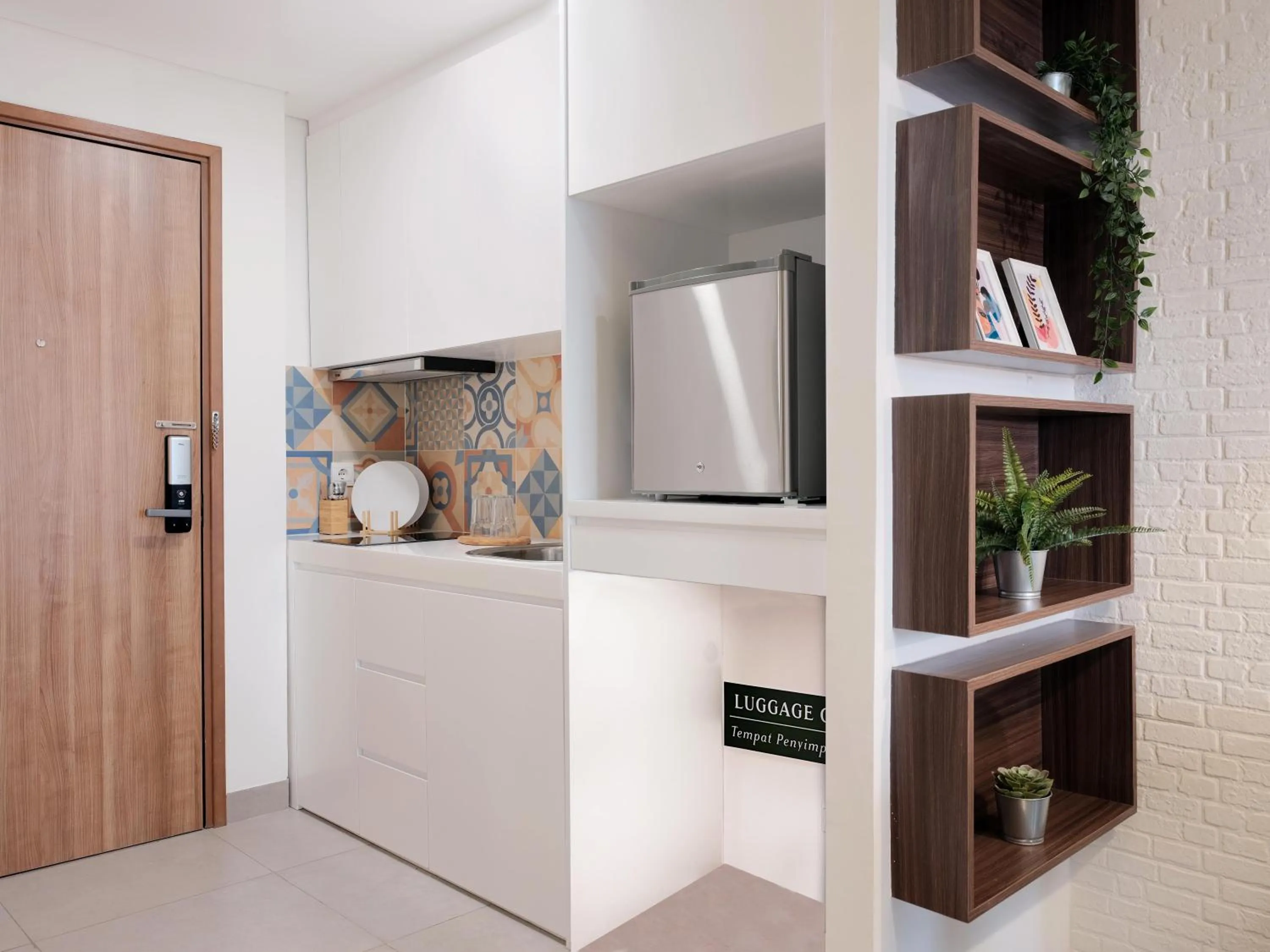 Kitchen or kitchenette in Fika Rooms Tangerang By Skandinavia