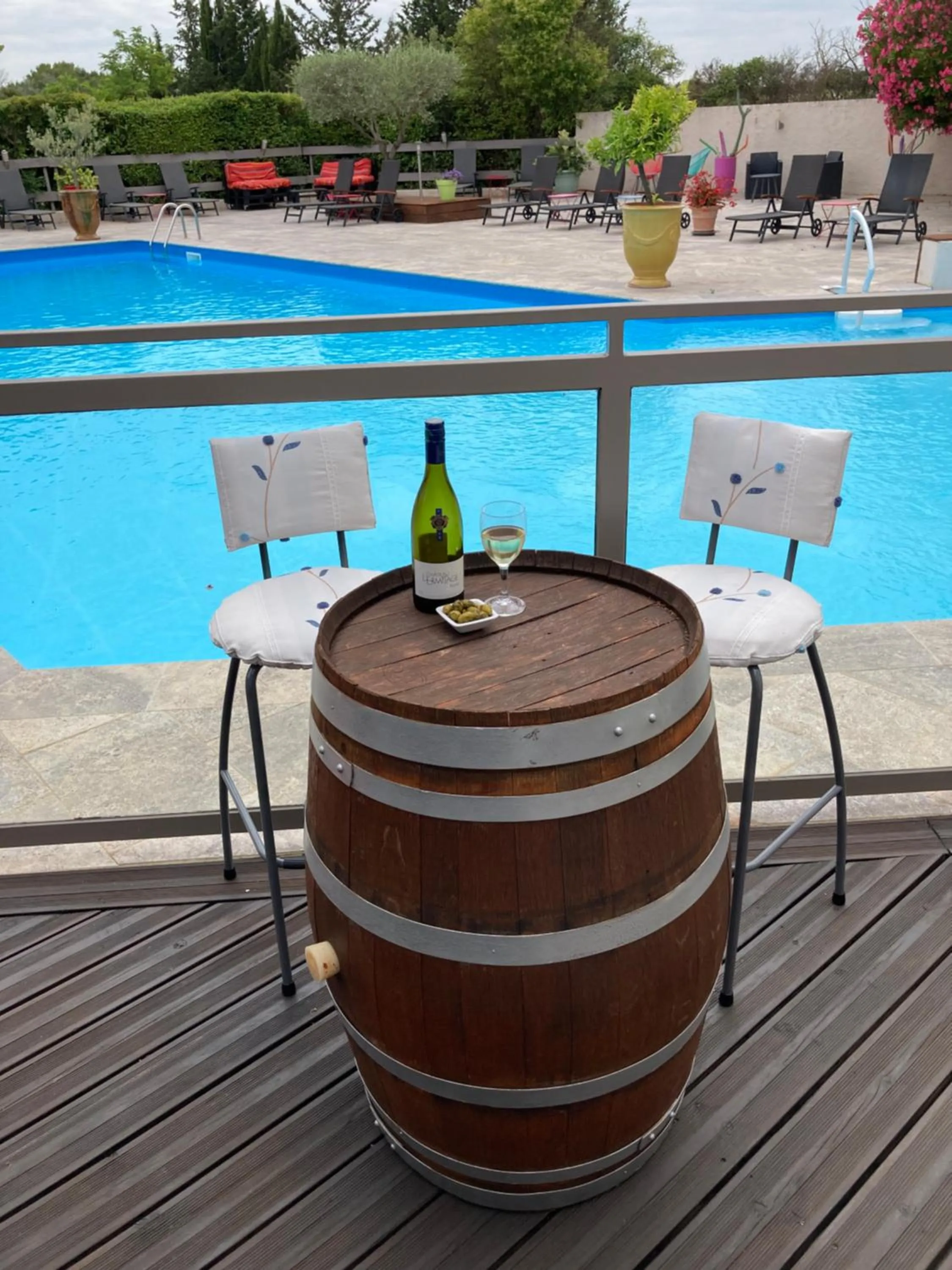 Swimming pool in Logis Hôtel Restaurant Les Aubuns