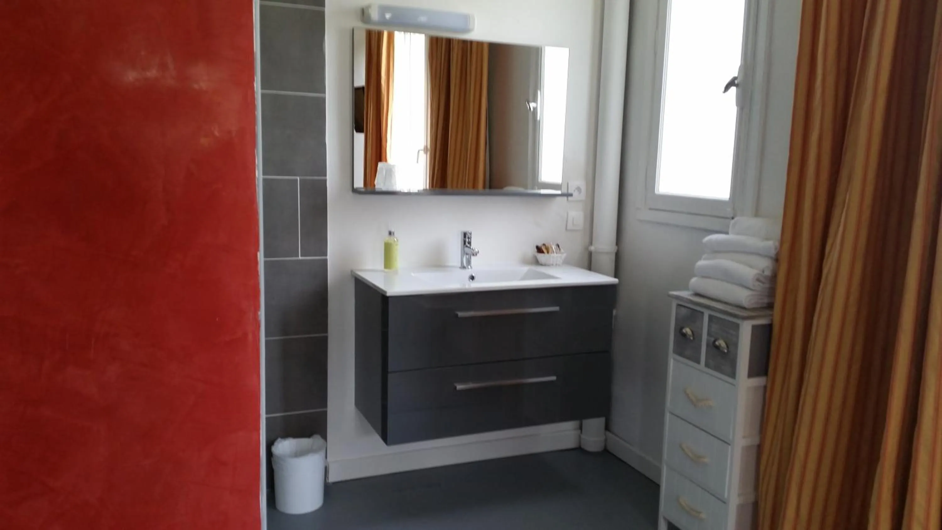 Bathroom in Logis Hôtel Restaurant Les Aubuns