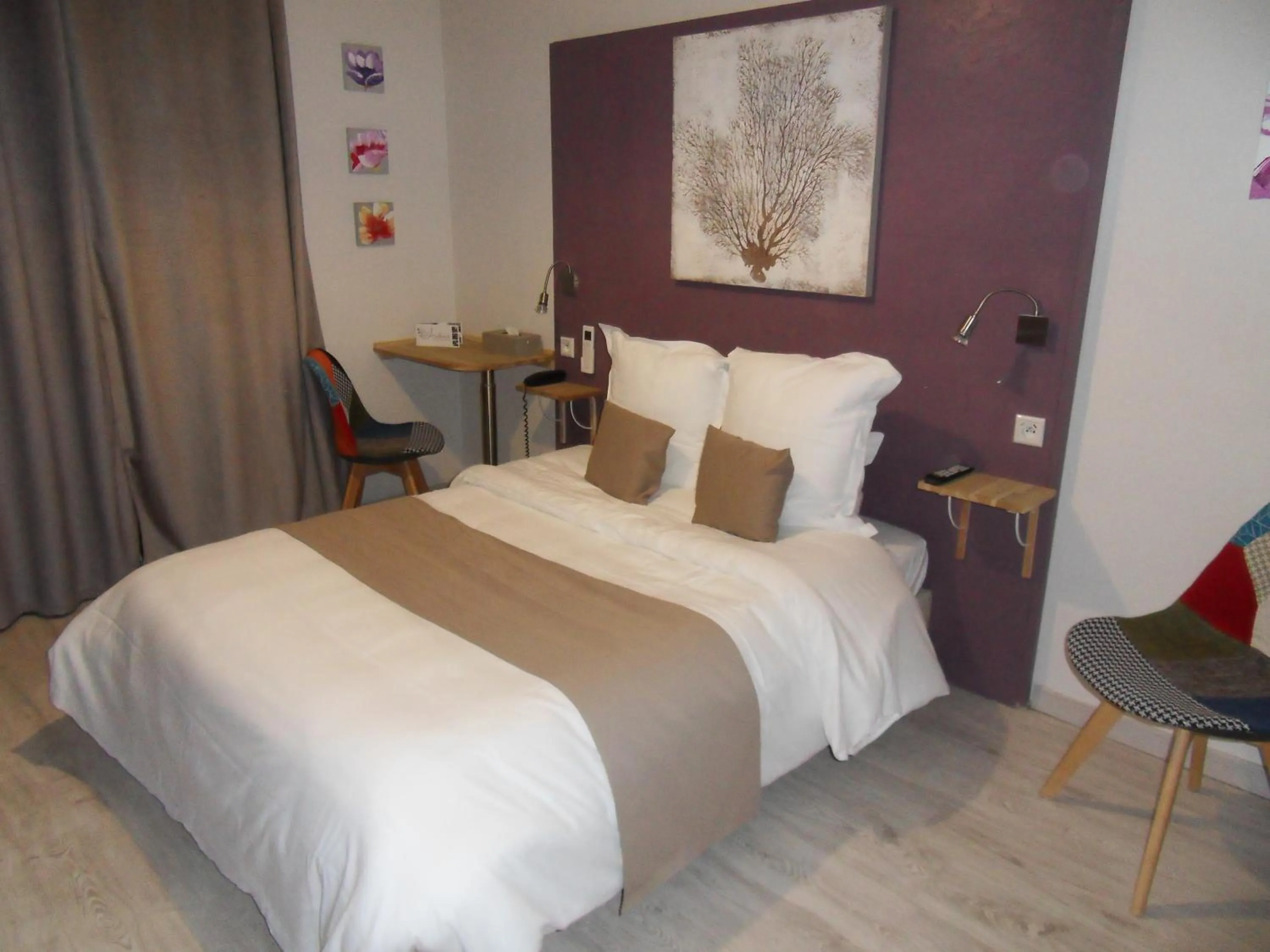 Photo of the whole room, Bed in Logis Hôtel Restaurant Les Aubuns