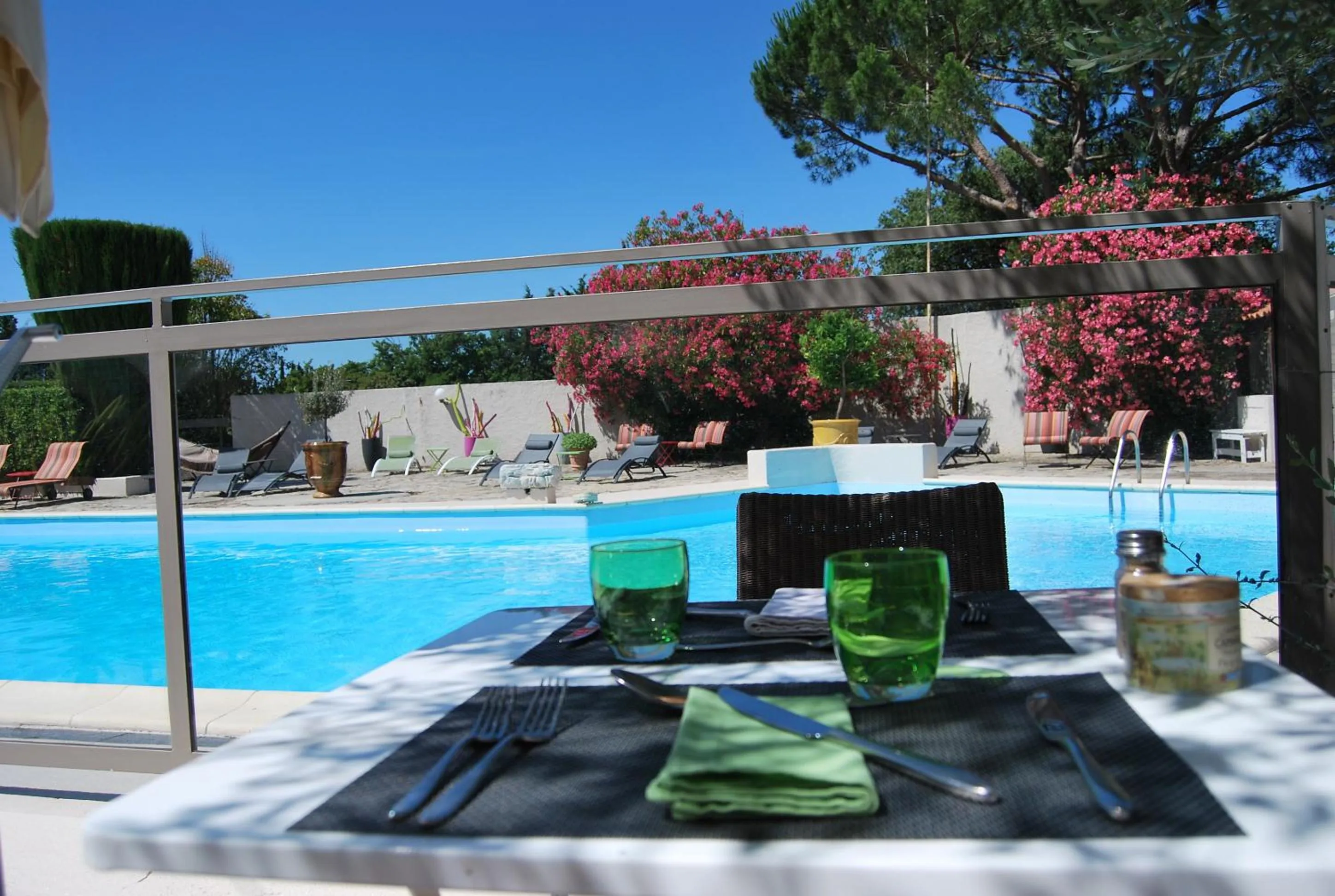 Patio in Logis Hôtel Restaurant Les Aubuns