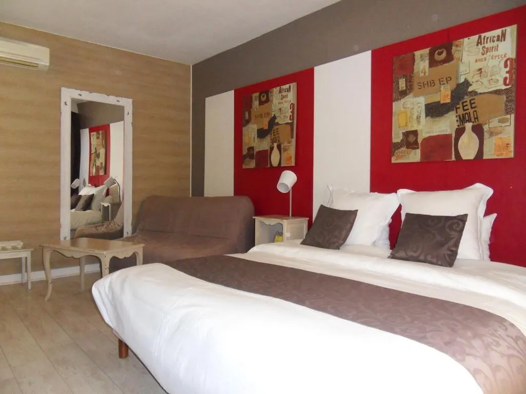 Photo of the whole room, Bed in Logis Hôtel Restaurant Les Aubuns