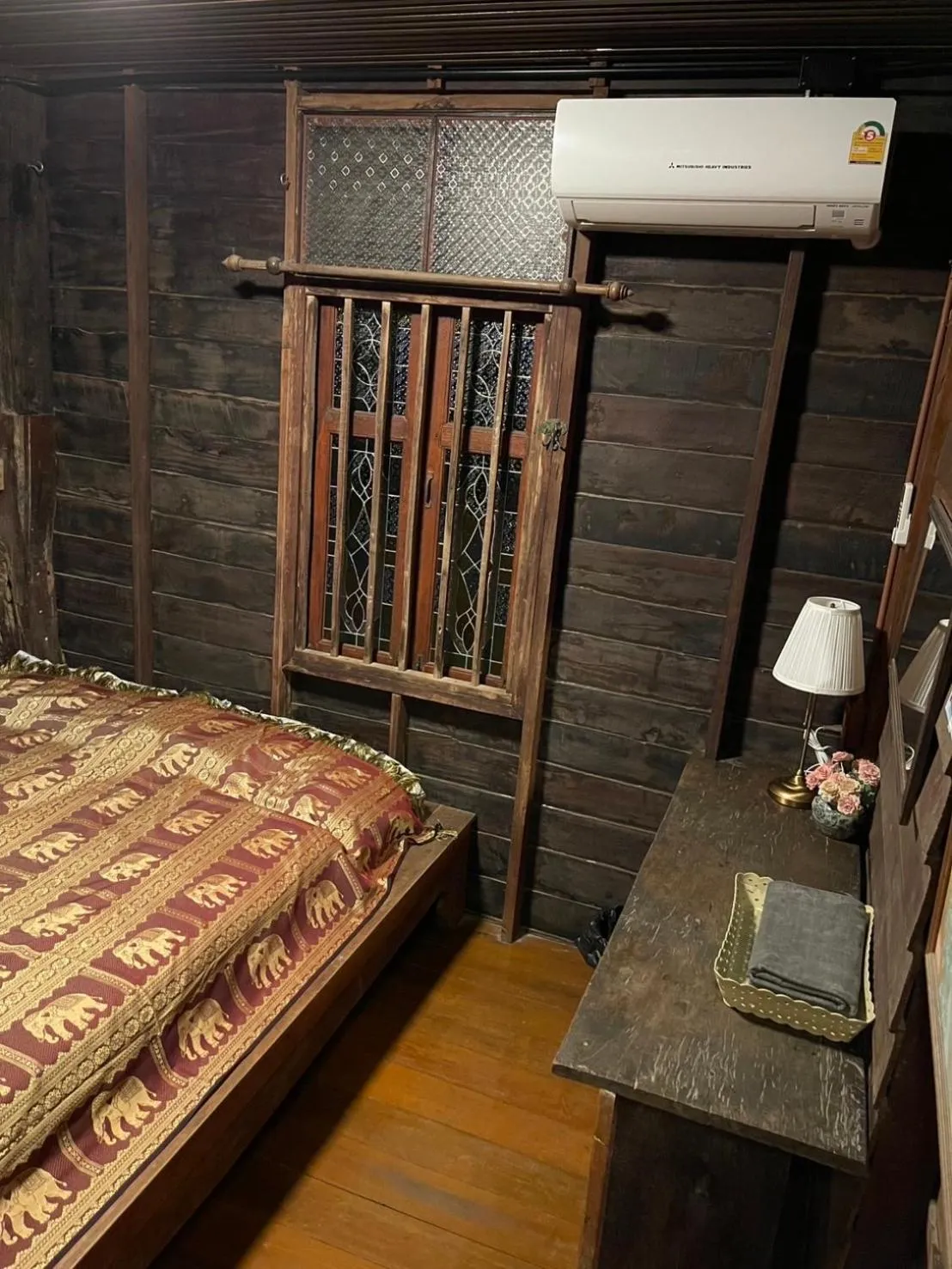 Bed in Ayothaya Riverside House