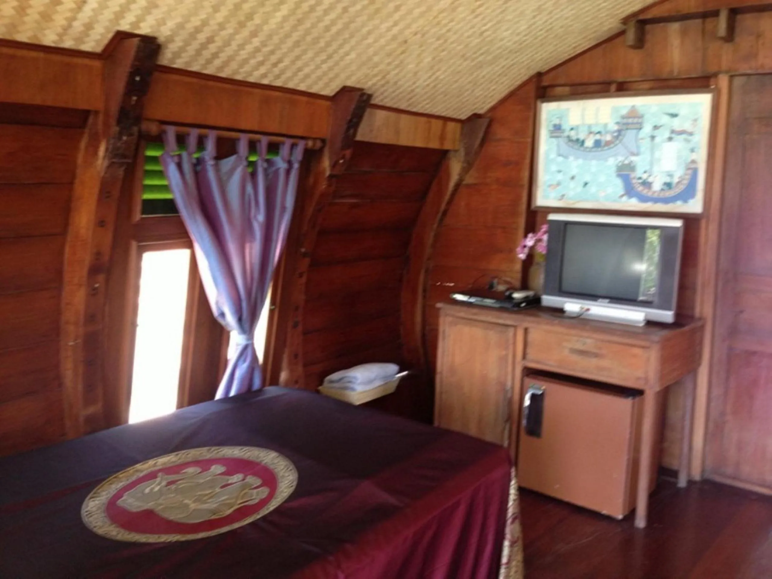 Bed in Ayothaya Riverside House