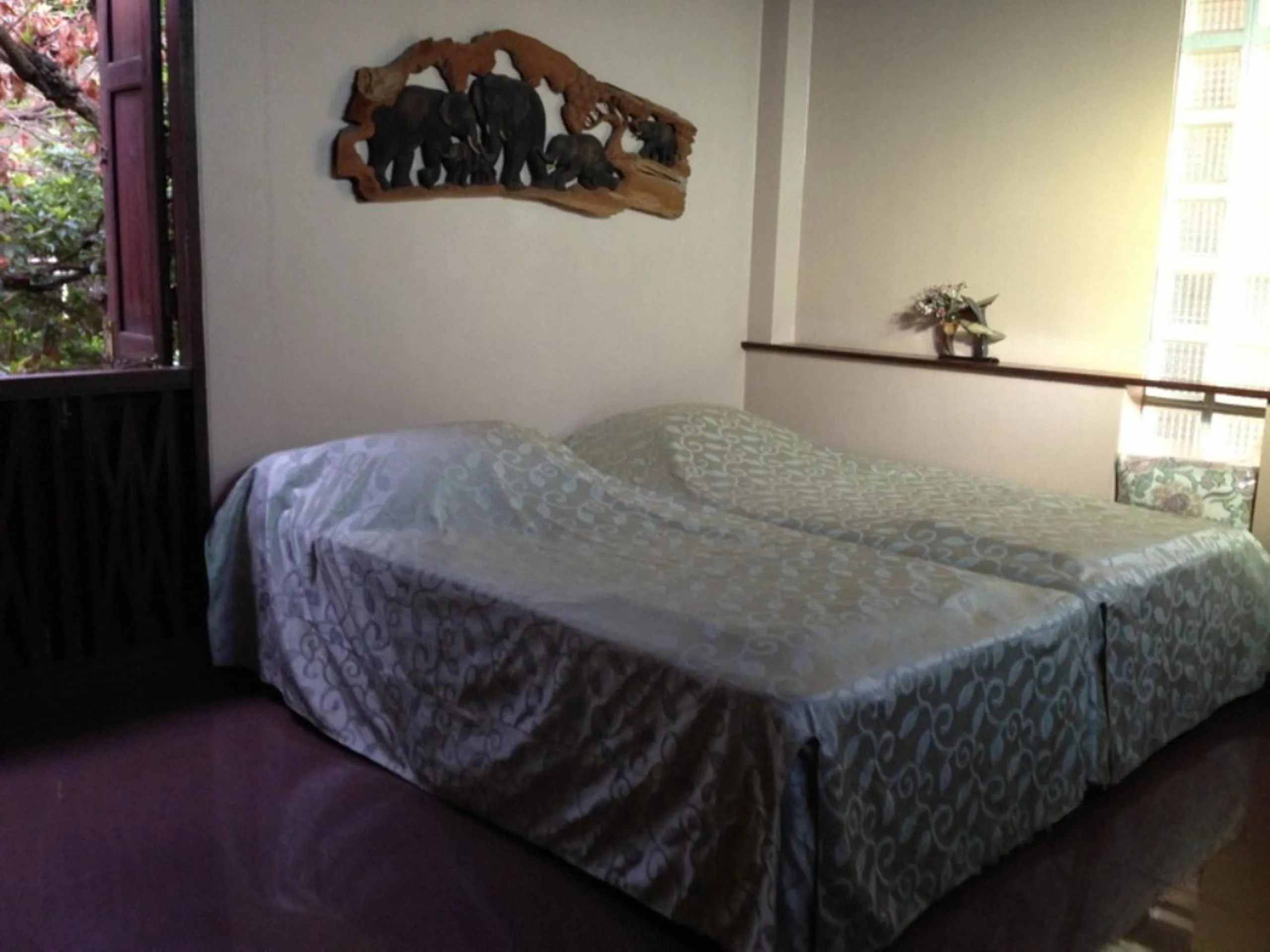 Bed in Ayothaya Riverside House