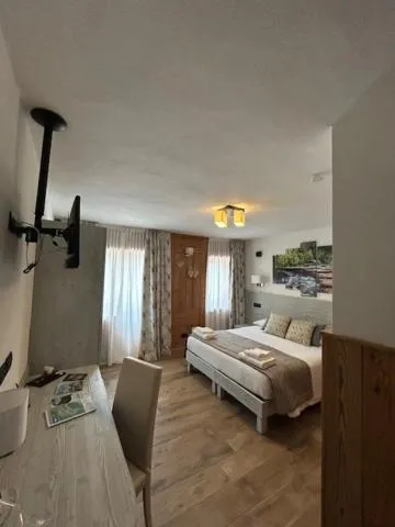 Bed in Edelweiss Hotel Champoluc